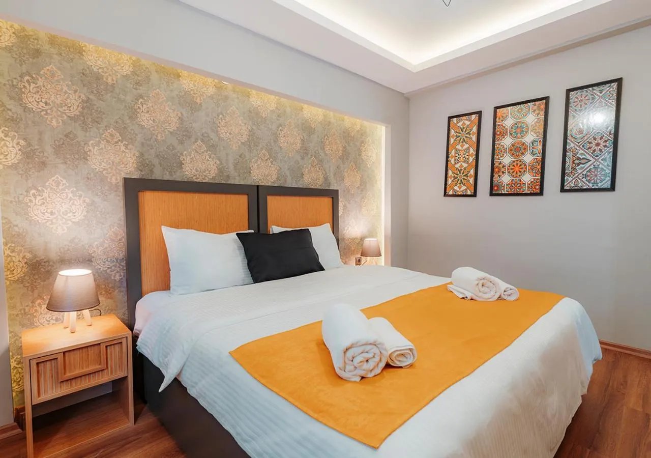 Bed in Umut Apartments