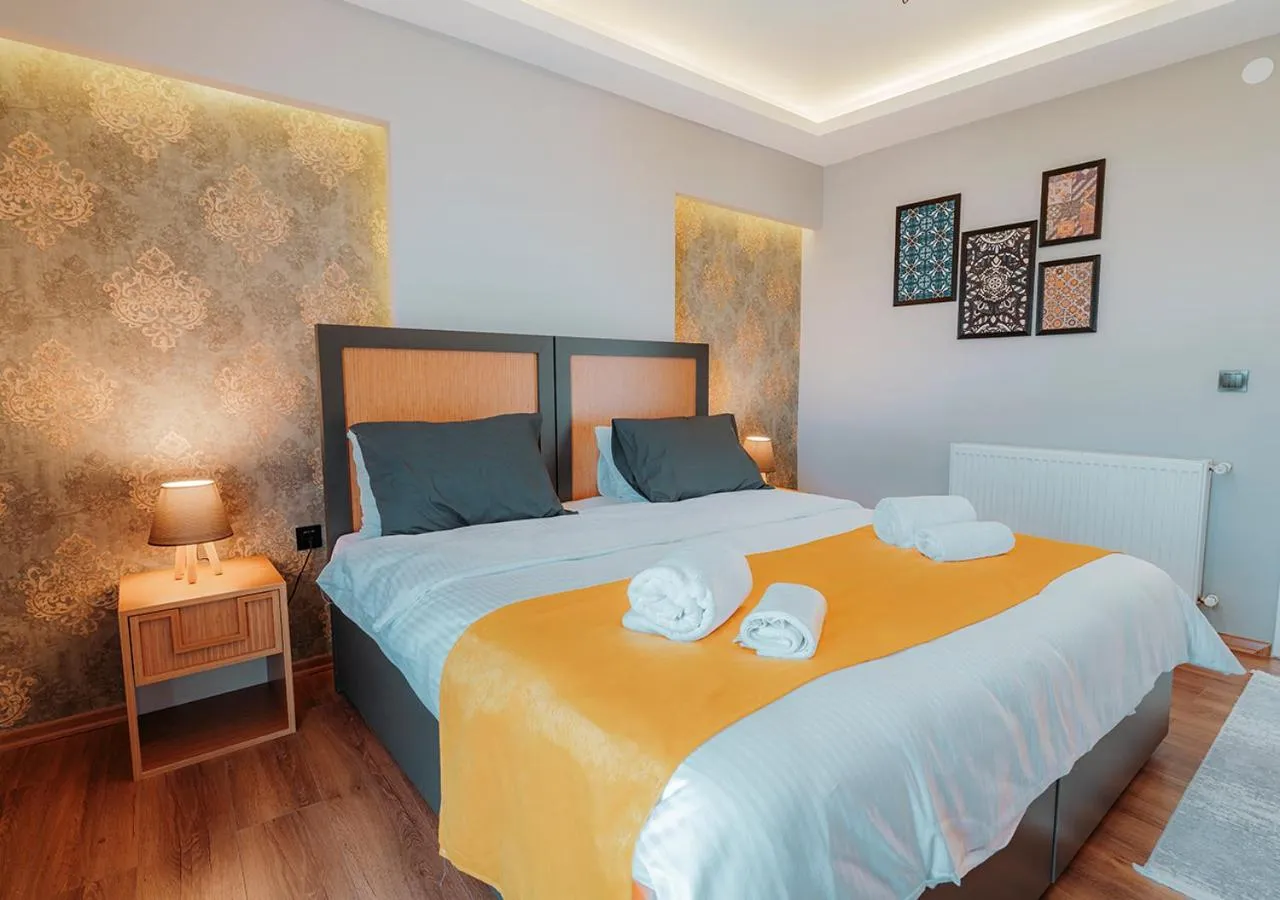 Bed in Umut Apartments