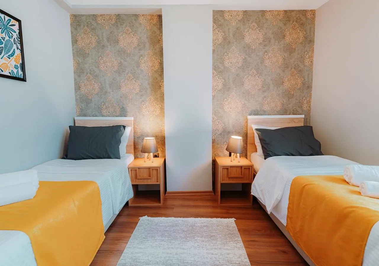 Bed in Umut Apartments