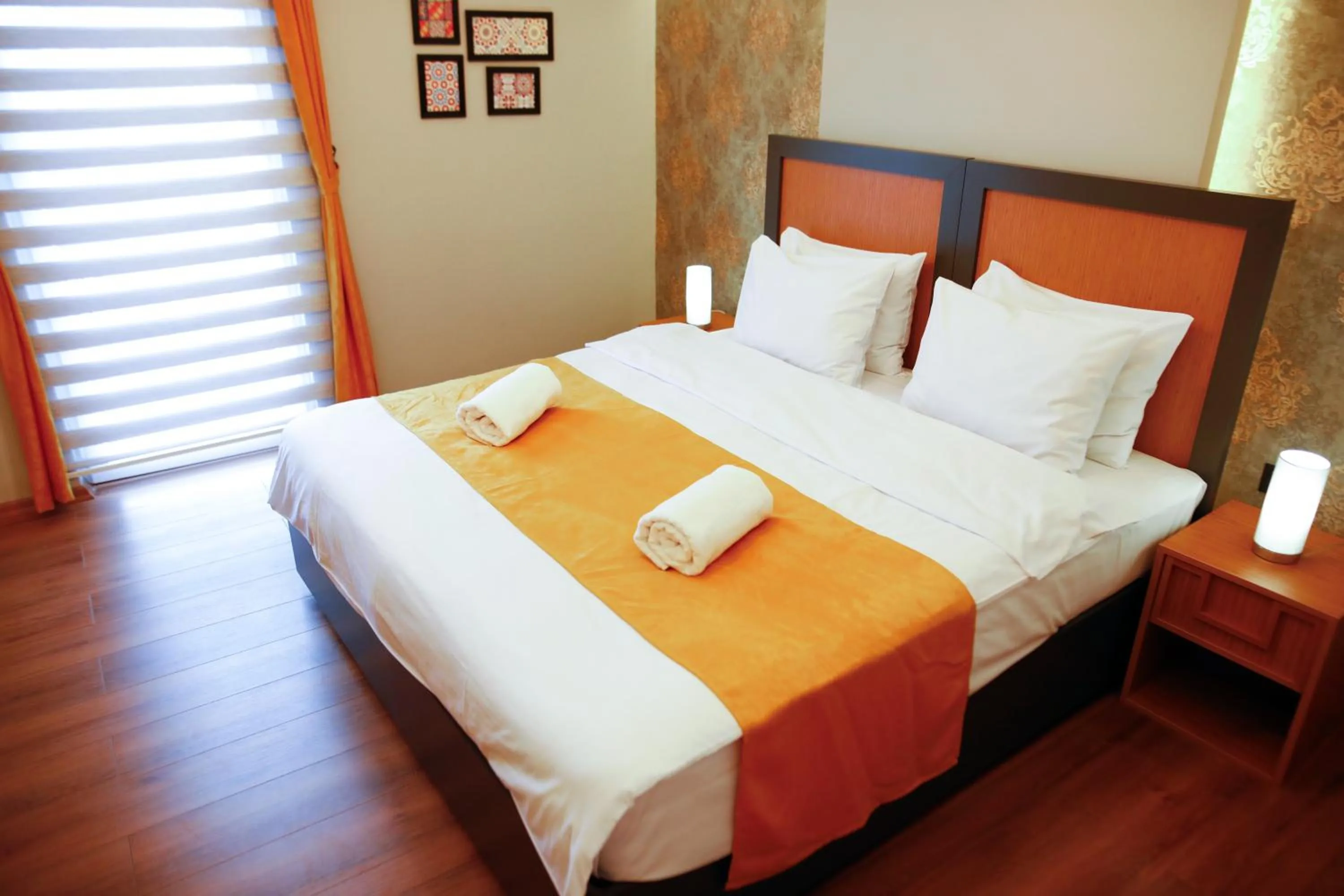Bed in Umut Apartments