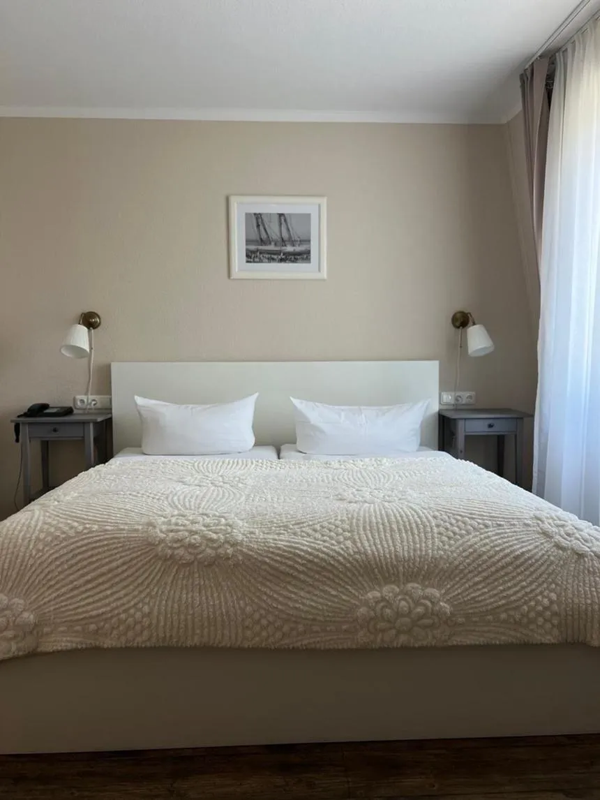 Bed in Hotel Admiral Scheer