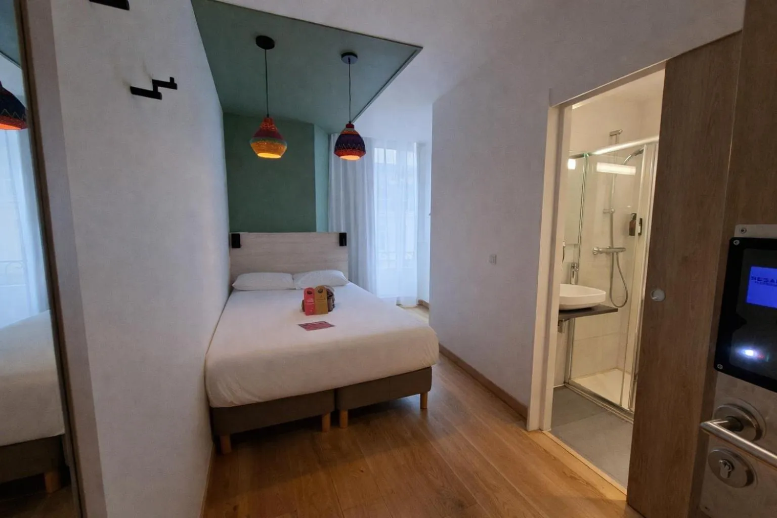 Bed in HOTEL AMBASSADEUR