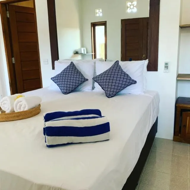 Bed in 3 Monkeys Lembongan Studio apartments gym recovery centre