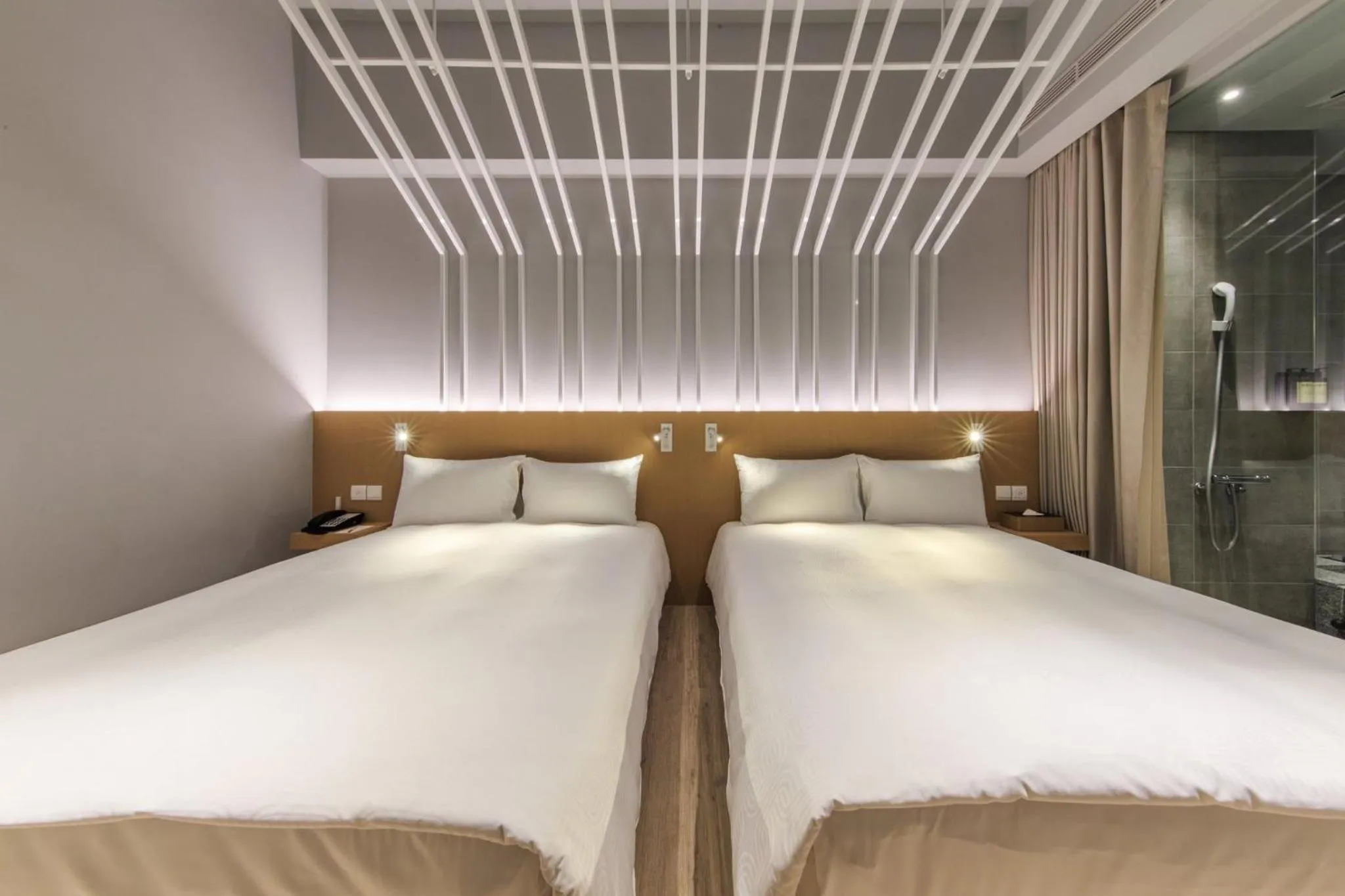 Bed in HOTEL PIN Jiaoxi