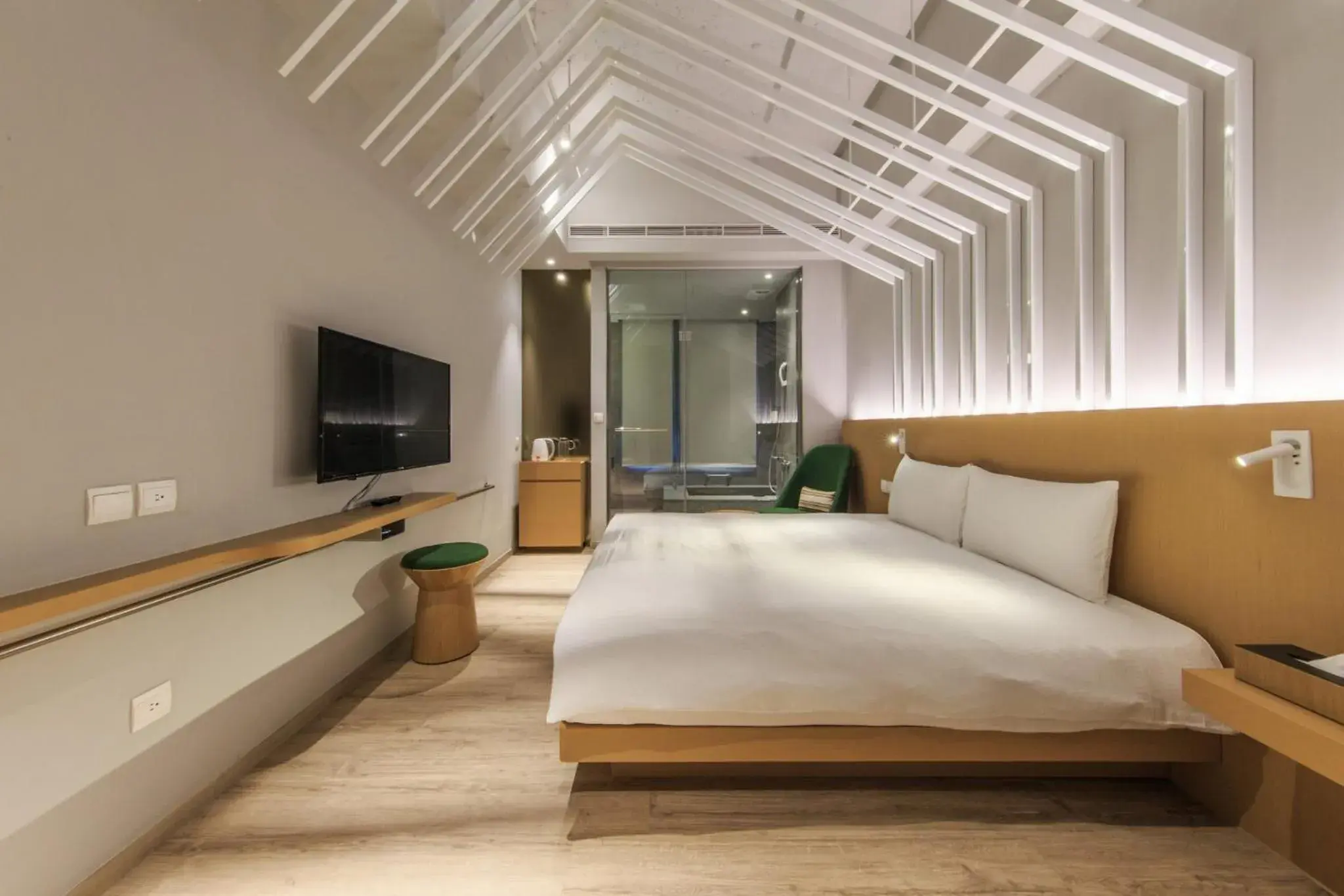 Bed in HOTEL PIN Jiaoxi Bed in HOTEL PIN Jiaoxi