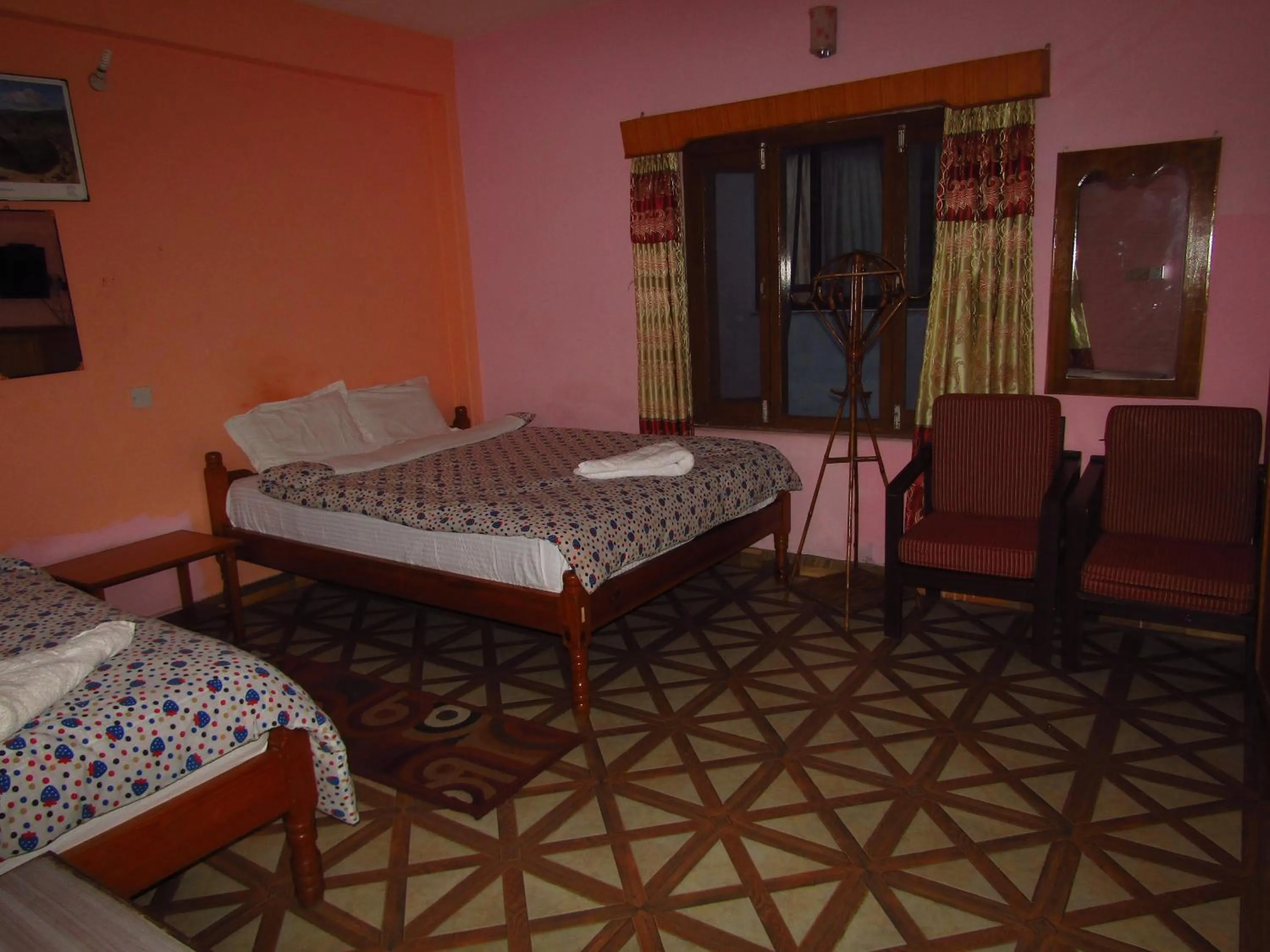 Bed in Hotel Lotus Inn