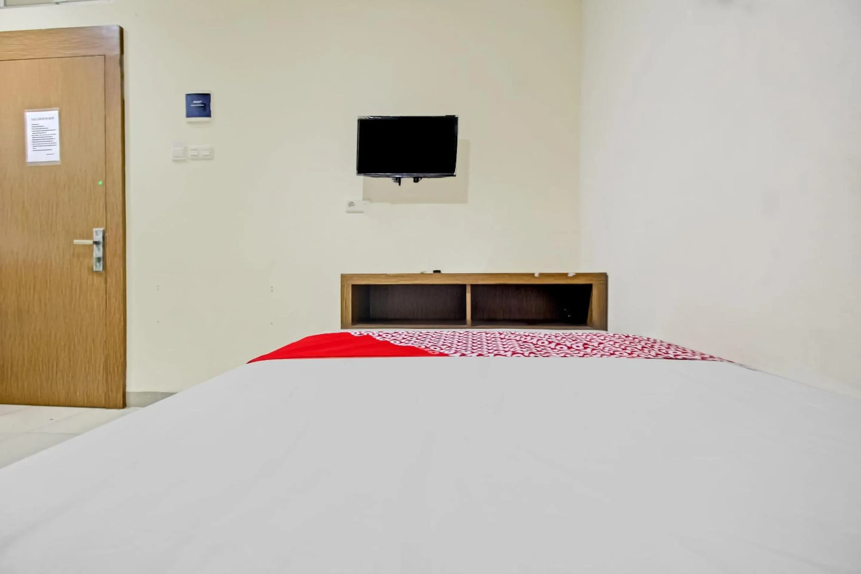 Bedroom in OYO 90412 My Kost