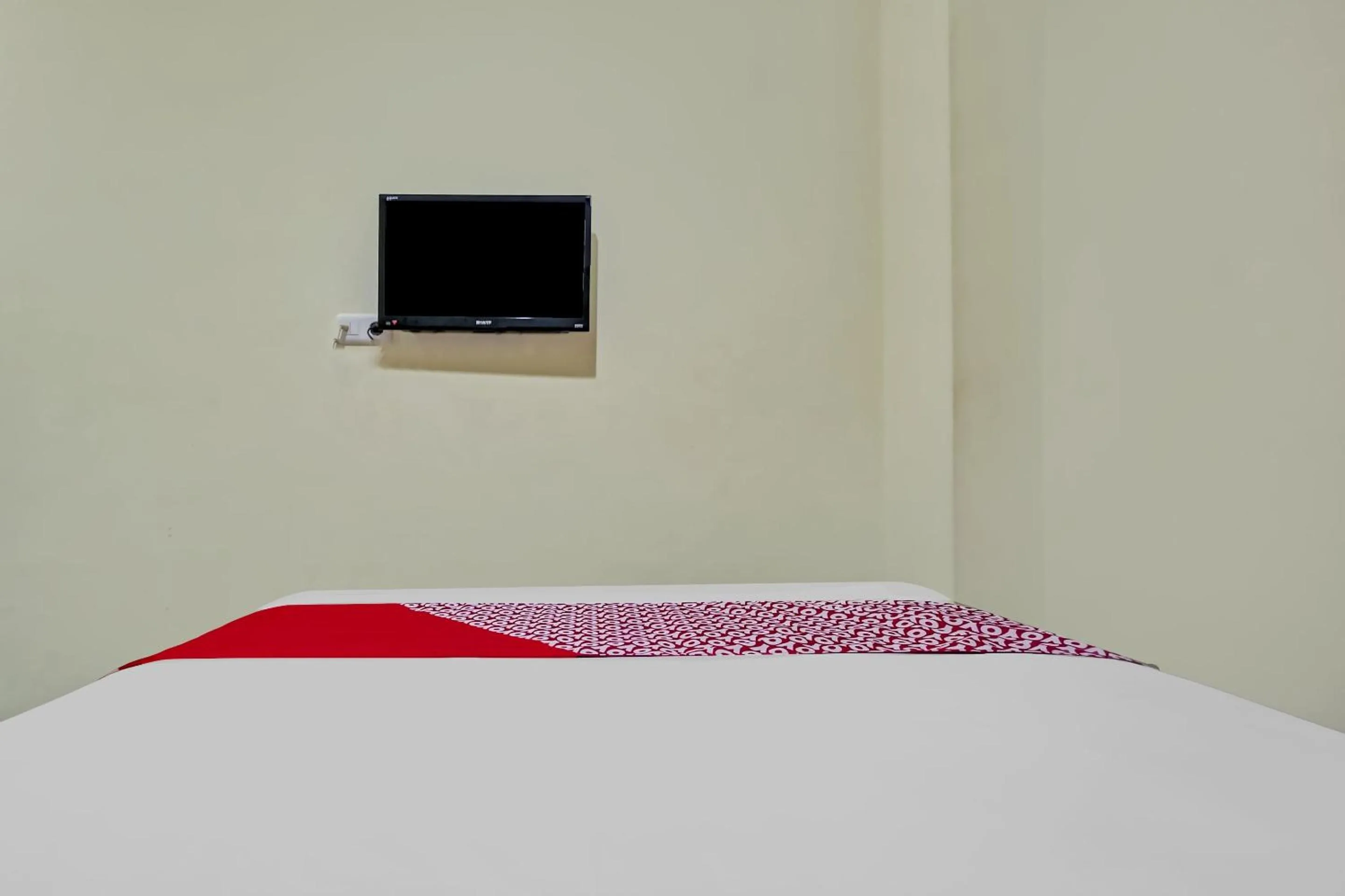 Bedroom in OYO 90412 My Kost