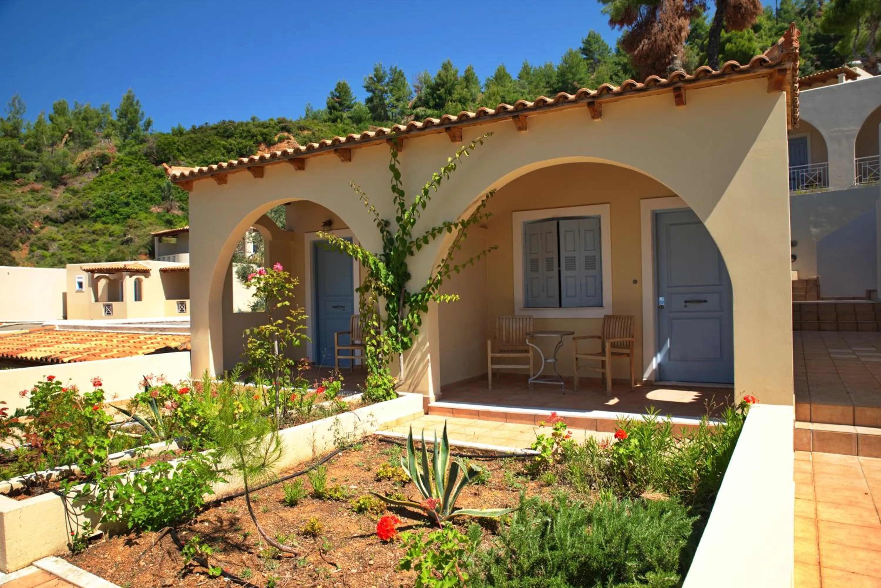 Garden view in Alonissos Beach Bungalows And Suites Hotel