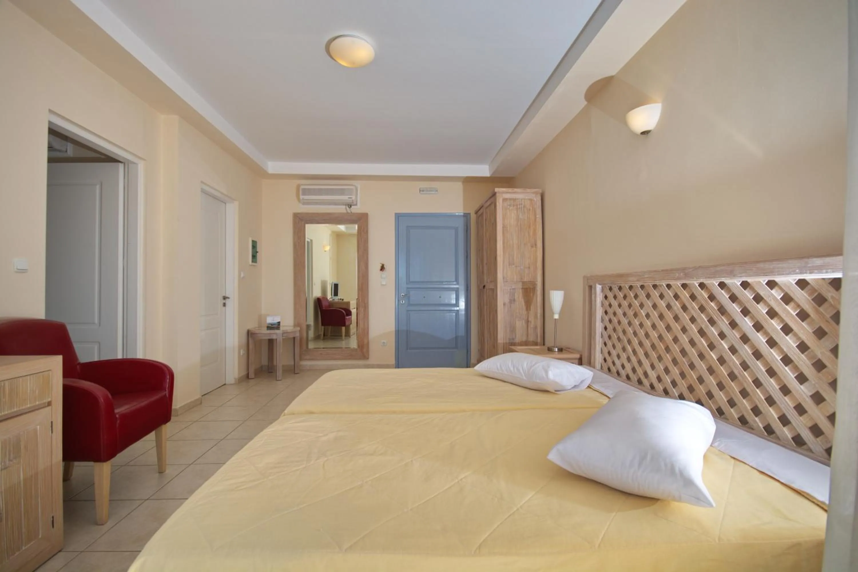 Bedroom, Bed in Alonissos Beach Bungalows And Suites Hotel