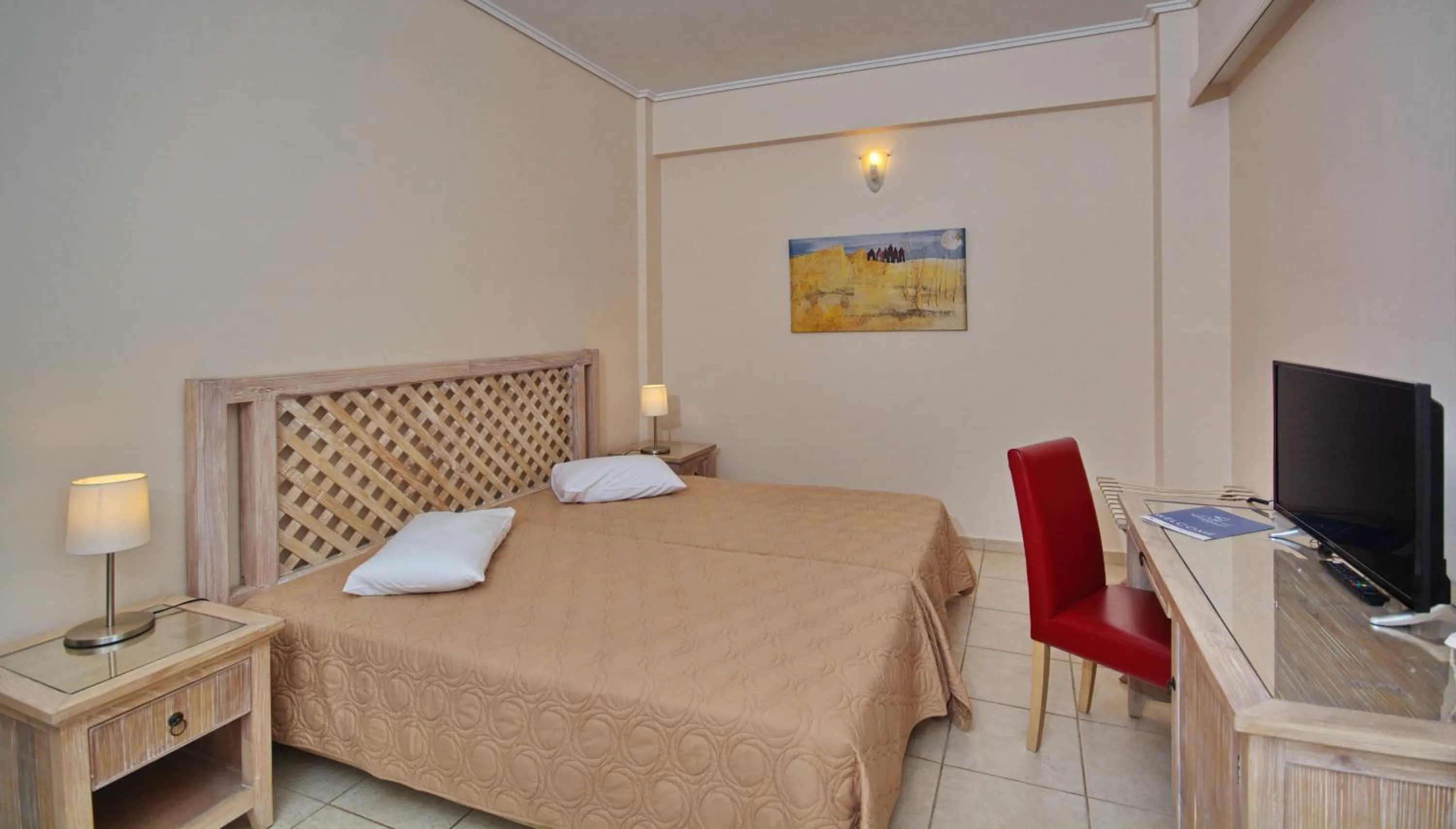 Bedroom, Bed in Alonissos Beach Bungalows And Suites Hotel