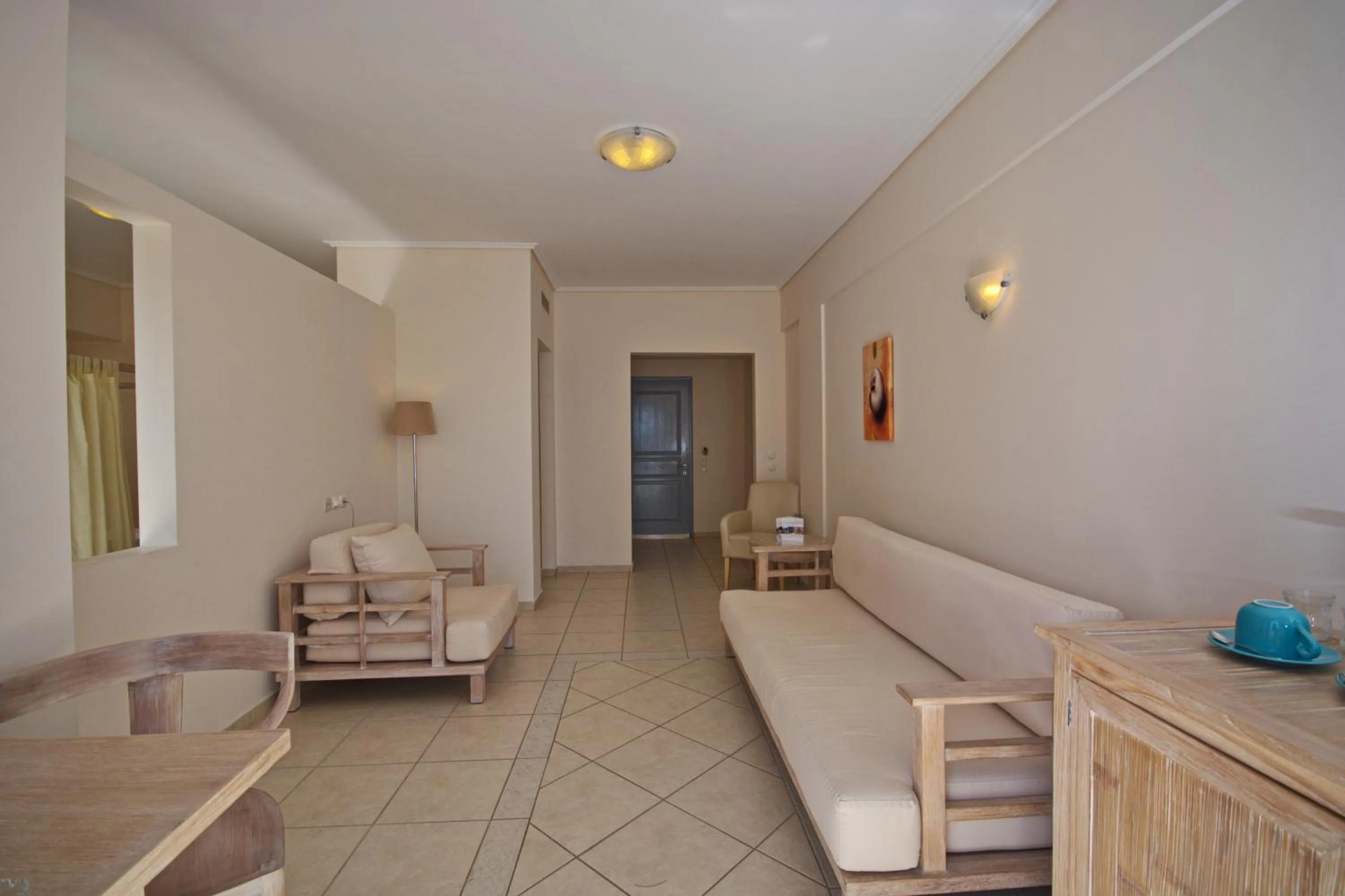 Living room in Alonissos Beach Bungalows And Suites Hotel