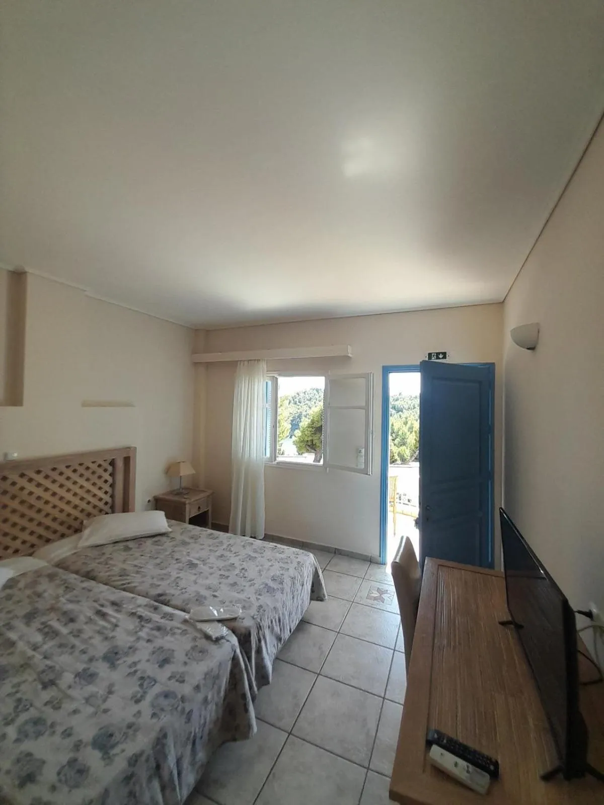 Bedroom, Bed in Alonissos Beach Bungalows And Suites Hotel