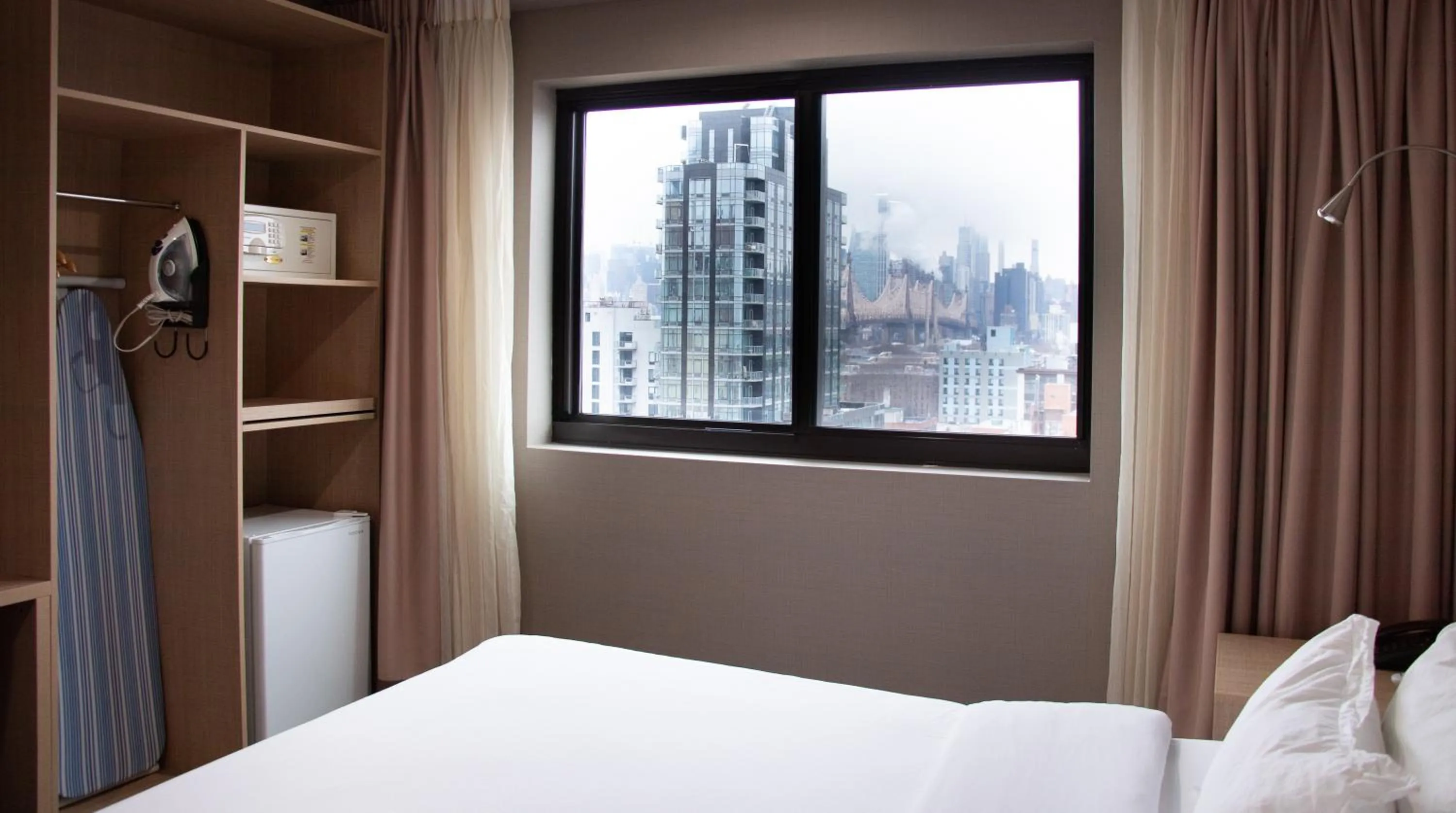 Bed in LIC Plaza Hotel