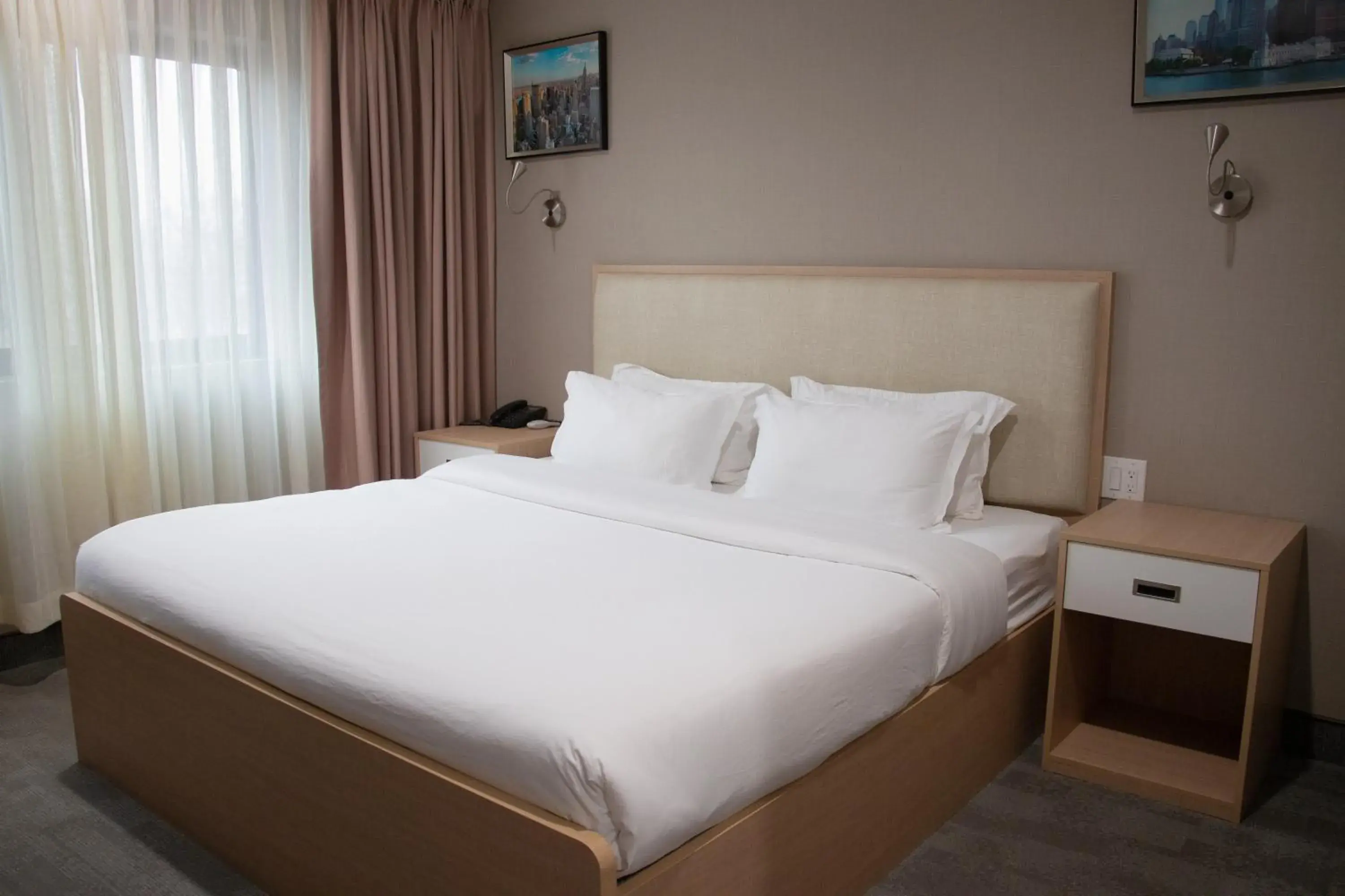 Bed in LIC Plaza Hotel Bed in LIC Plaza Hotel