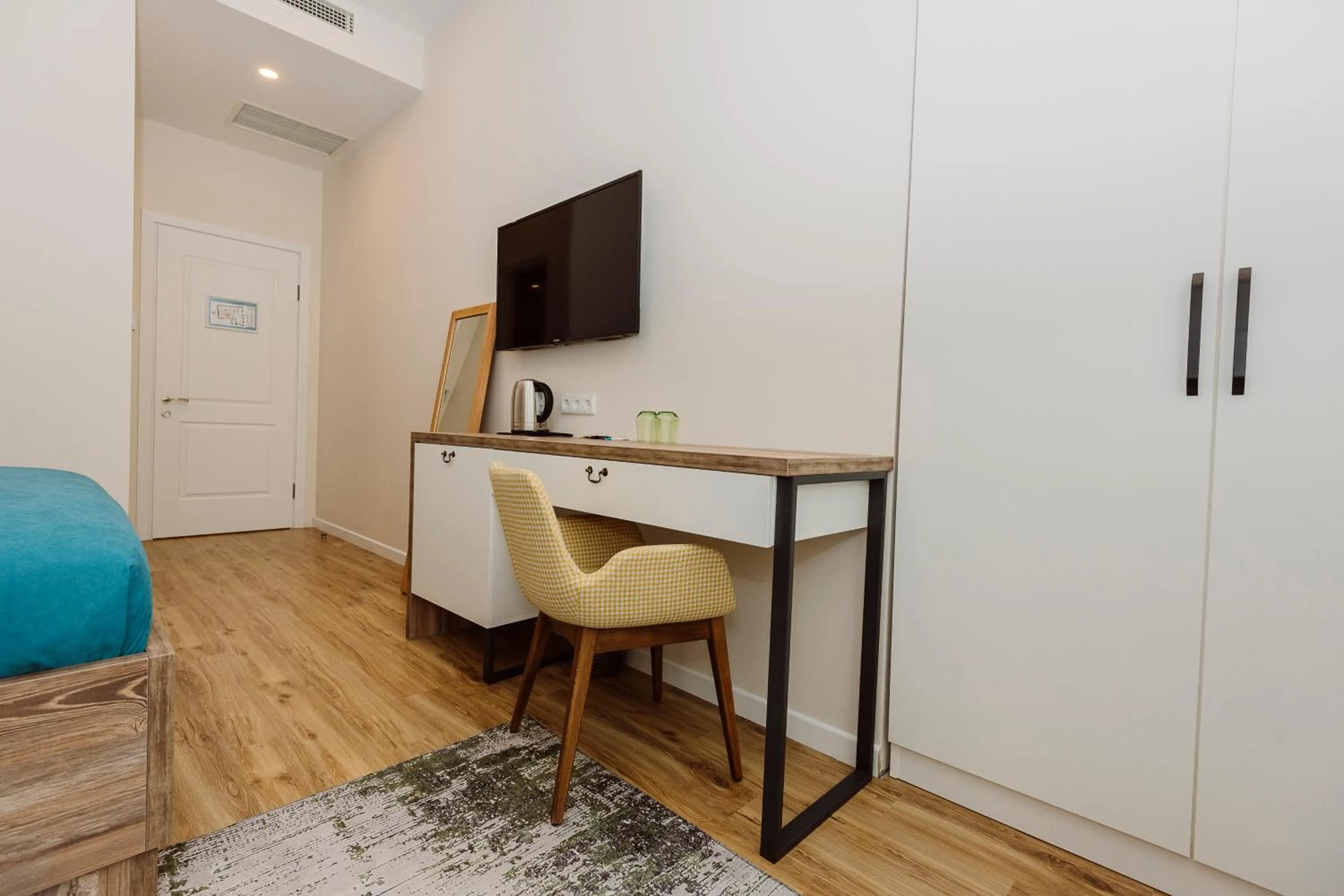 Communal lounge/ TV room in Boulevard Hotel Batumi