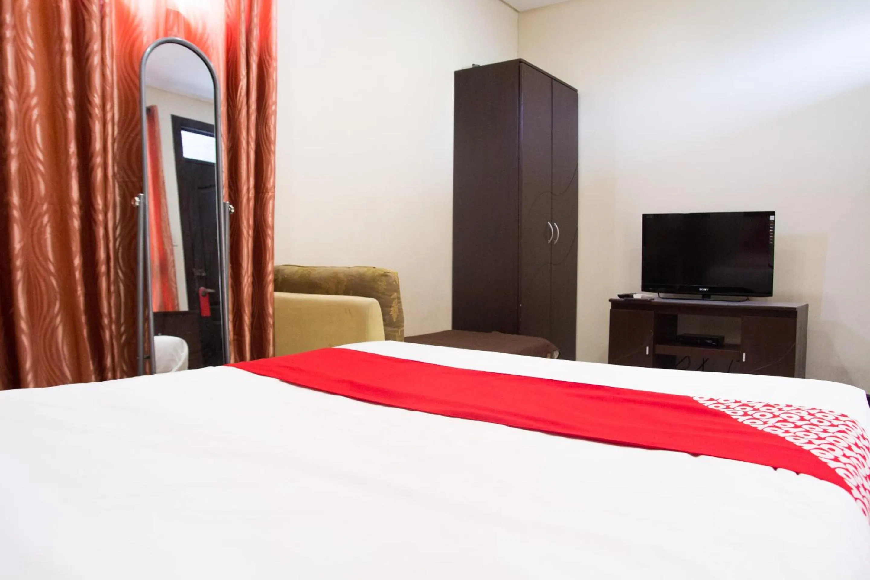 Bedroom in OYO 153 Espacio de Clarita Hometel