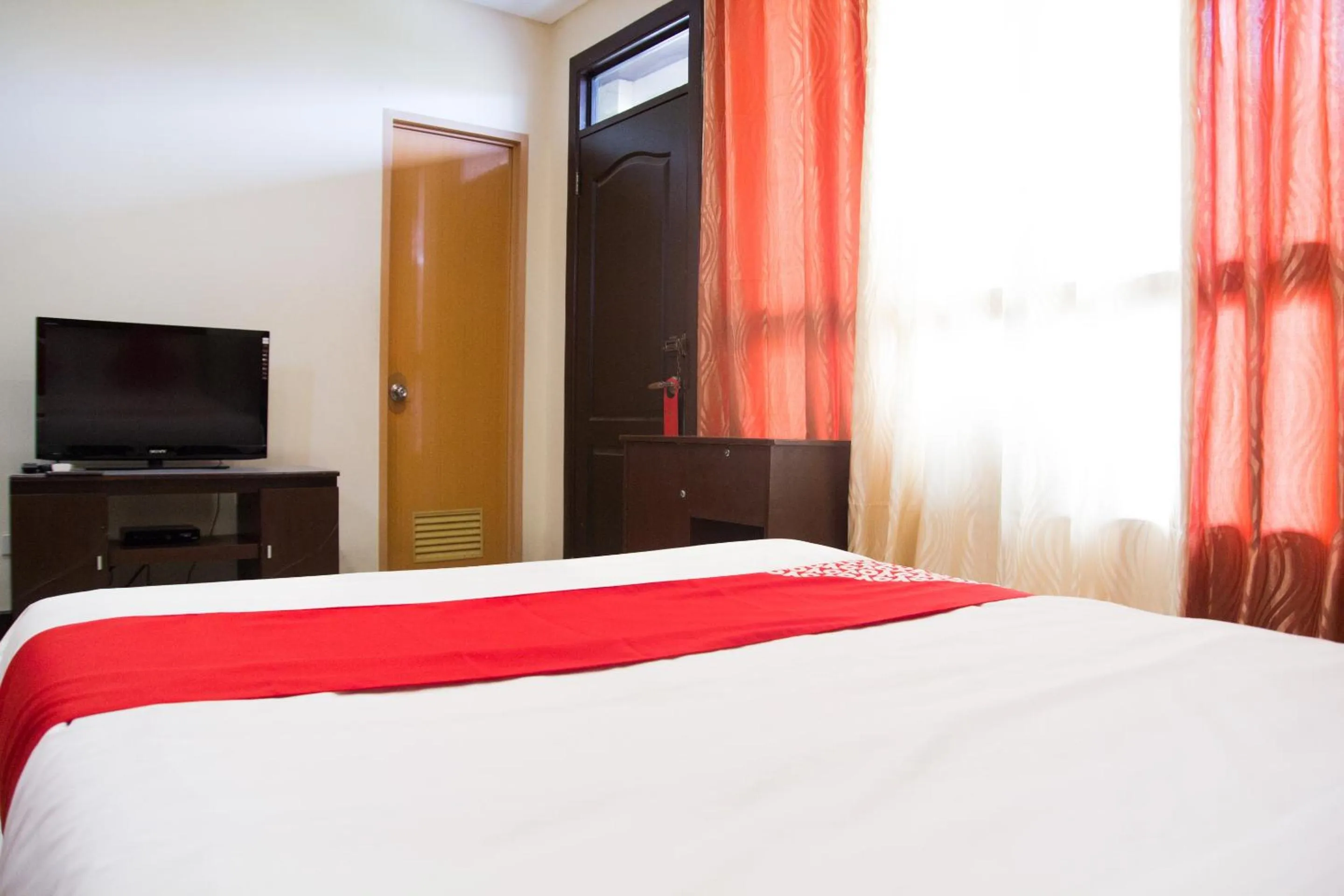 Bedroom in OYO 153 Espacio de Clarita Hometel