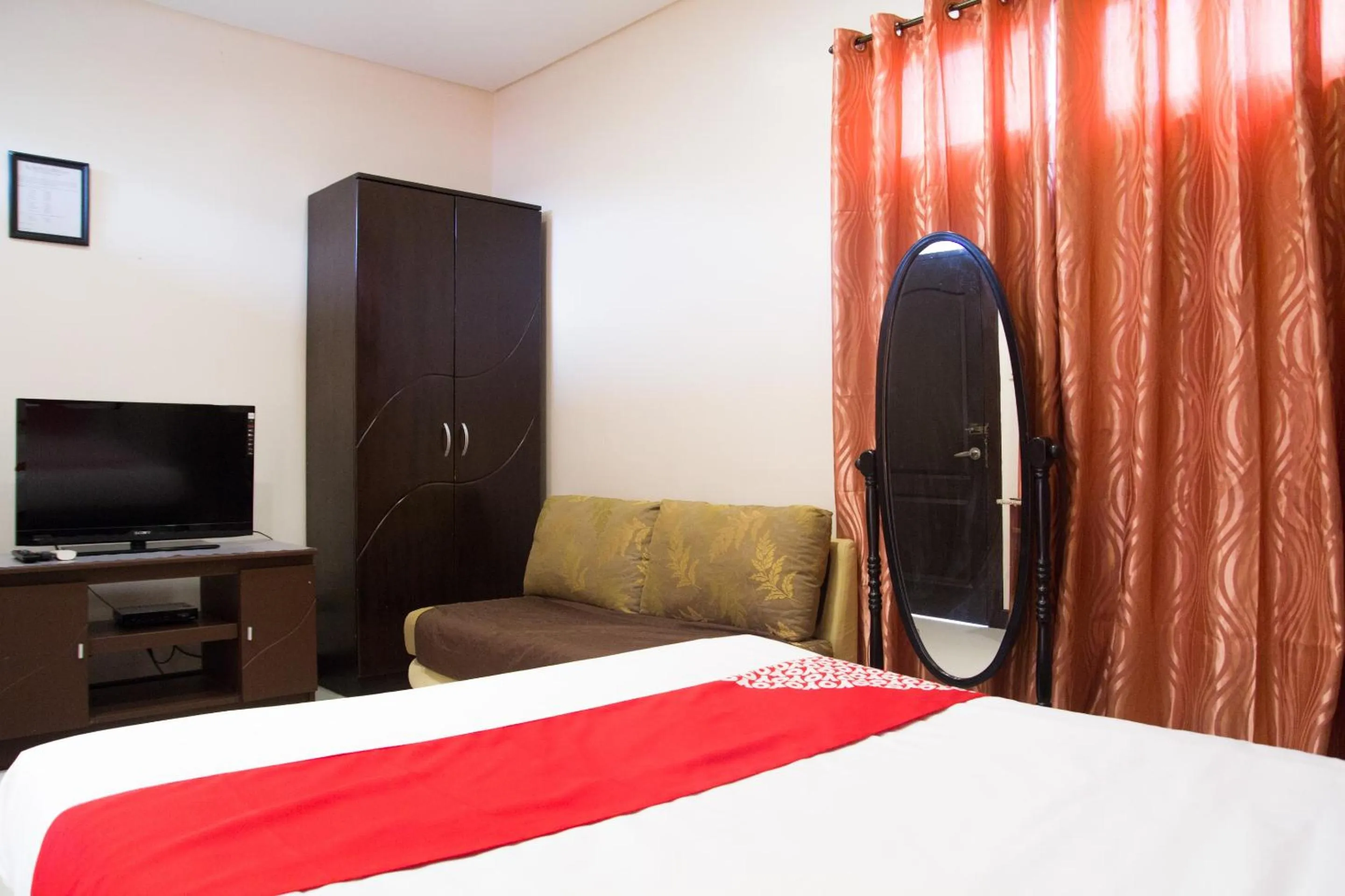 Bedroom in OYO 153 Espacio de Clarita Hometel