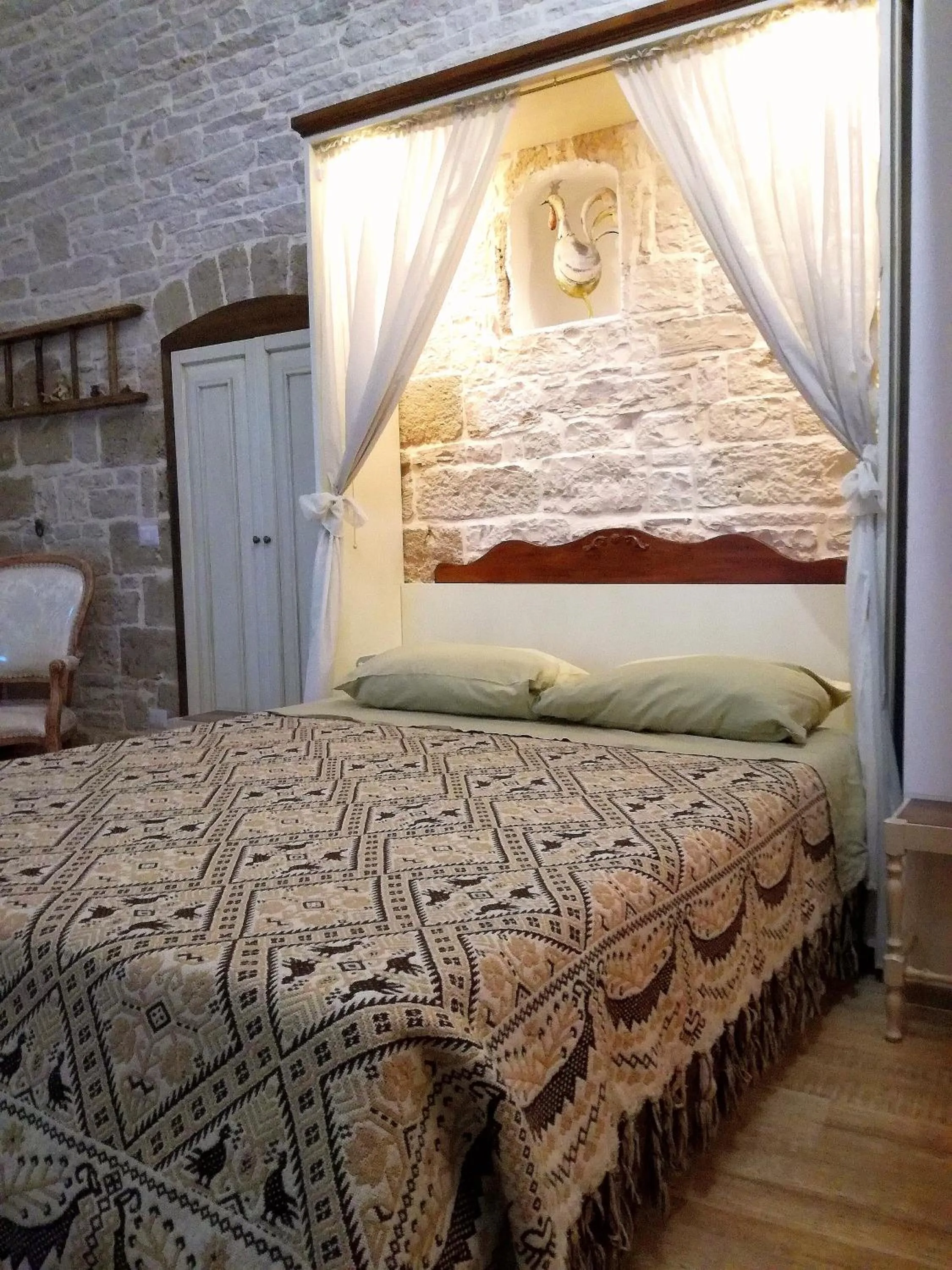 Bed in Oltre le mura b&b