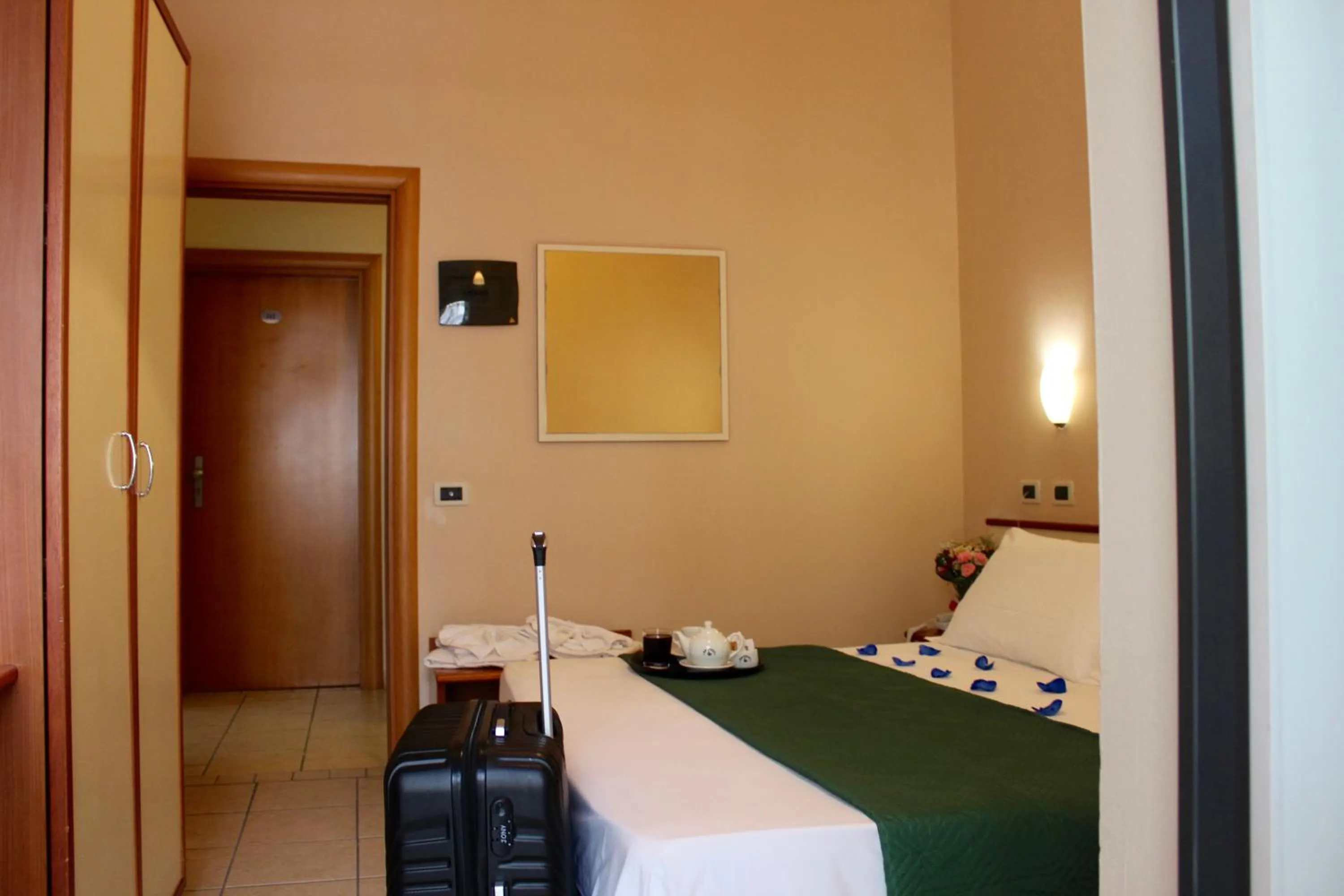 Photo of the whole room, Bed in Blue Hotel