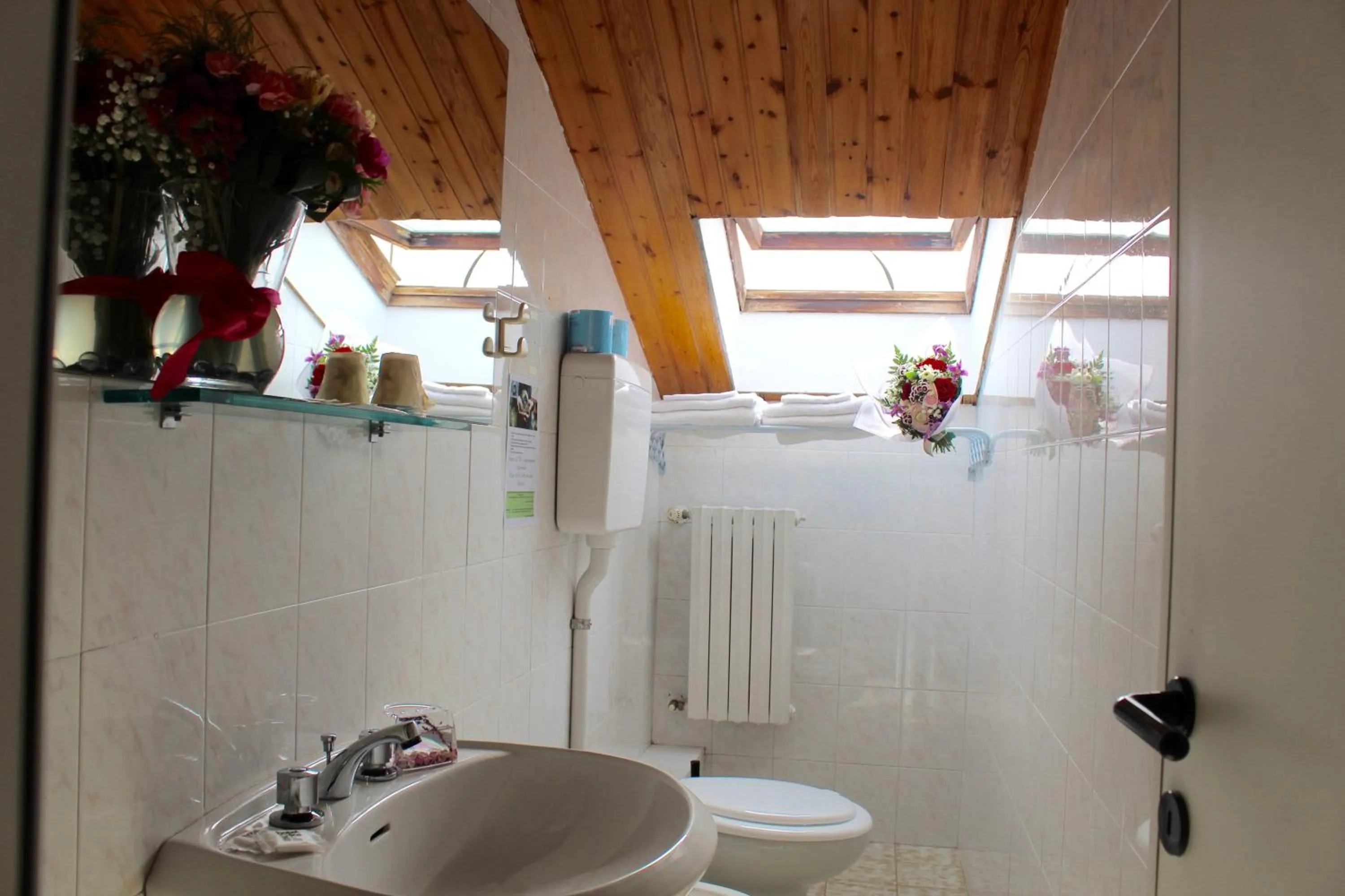 Toilet in Blue Hotel