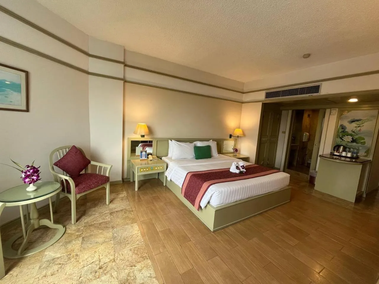 Bed in Cholchan Pattaya Beach Resort - SHA Extra Plus