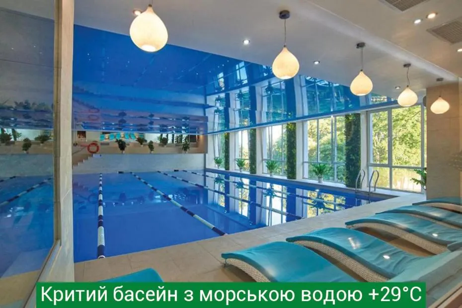 Pool view in Hotel & Spa NEMO with dolphins