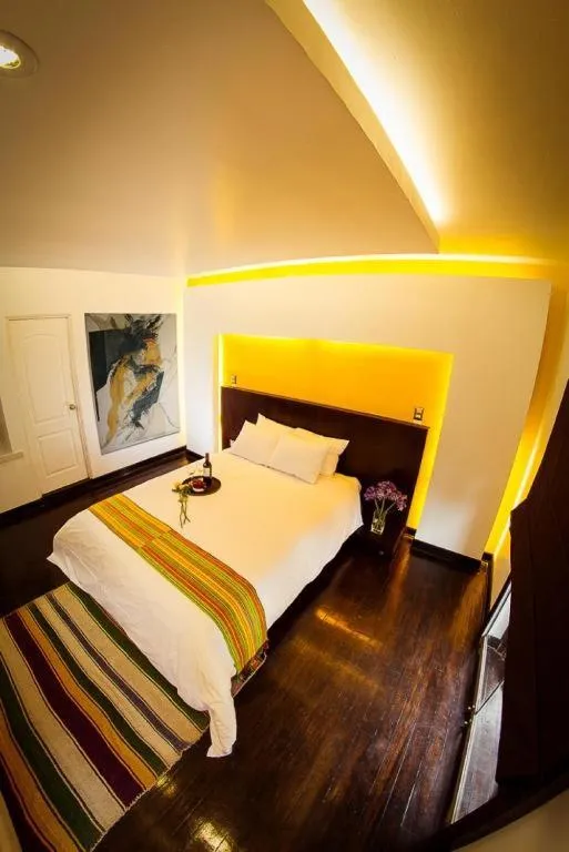 Bed in Wakapunku Boutique Hotel