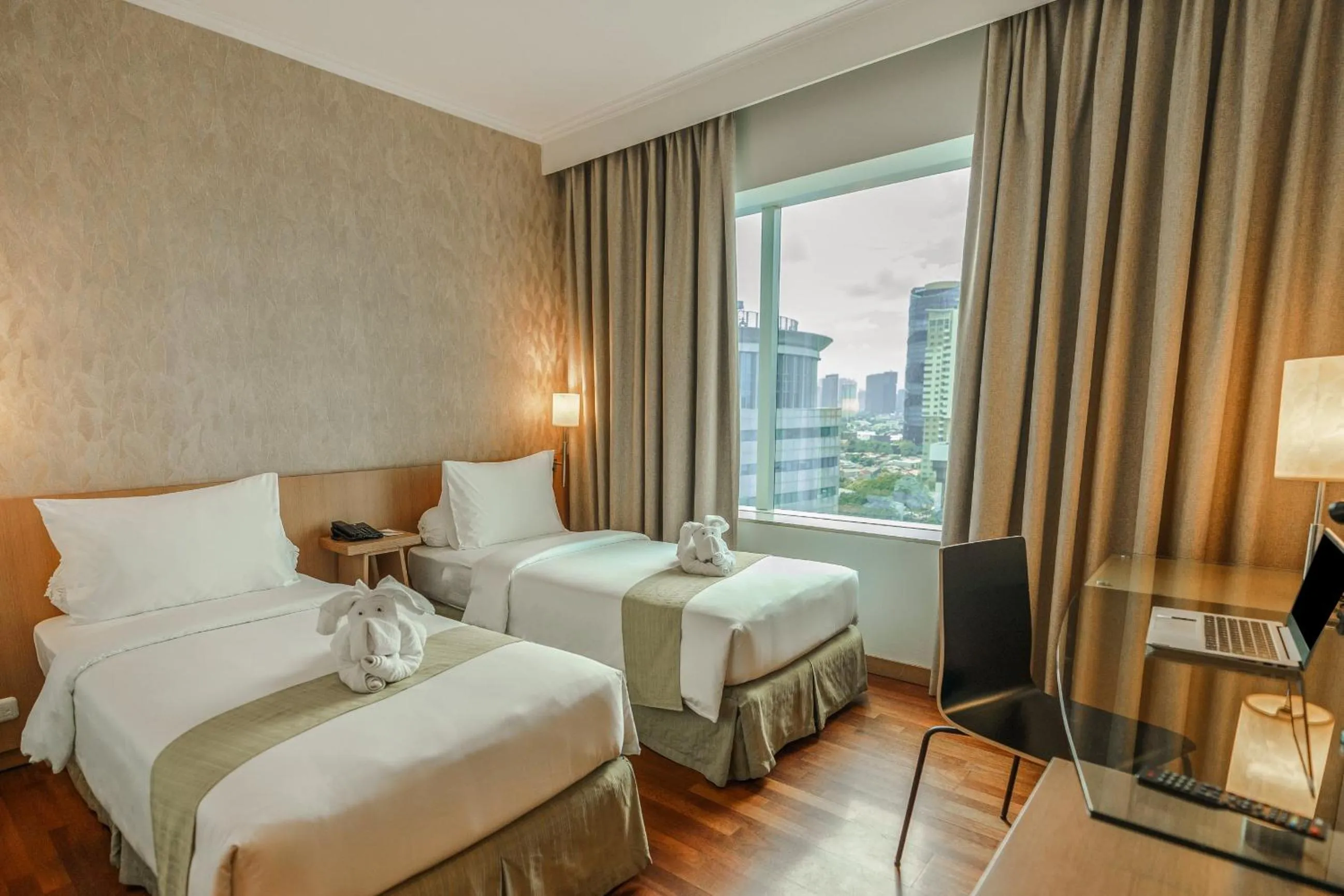 Photo of the whole room, Bed in Hotel KIMAYA Slipi Jakarta By HARRIS