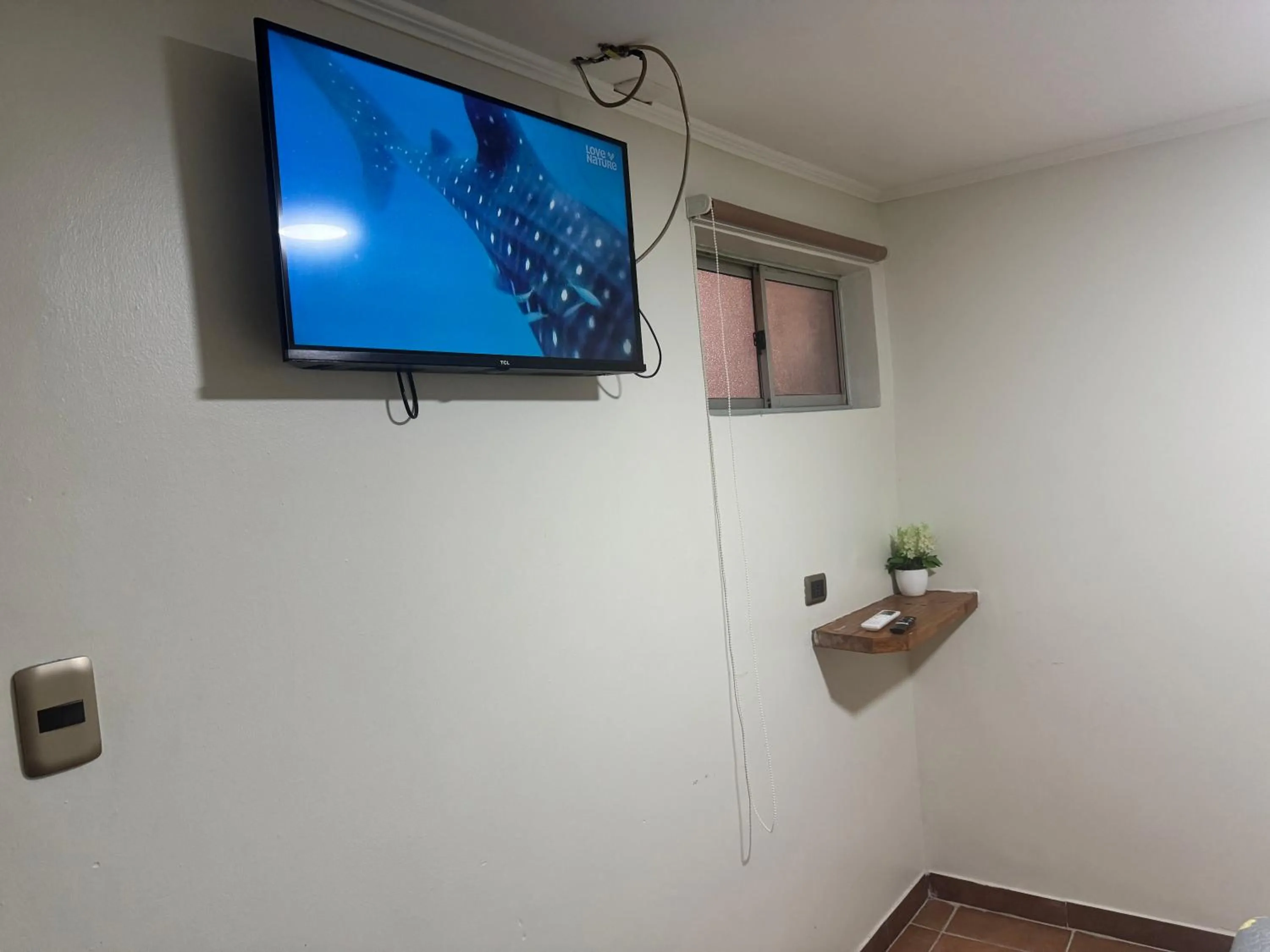 TV and multimedia in Residencial Don Santiago