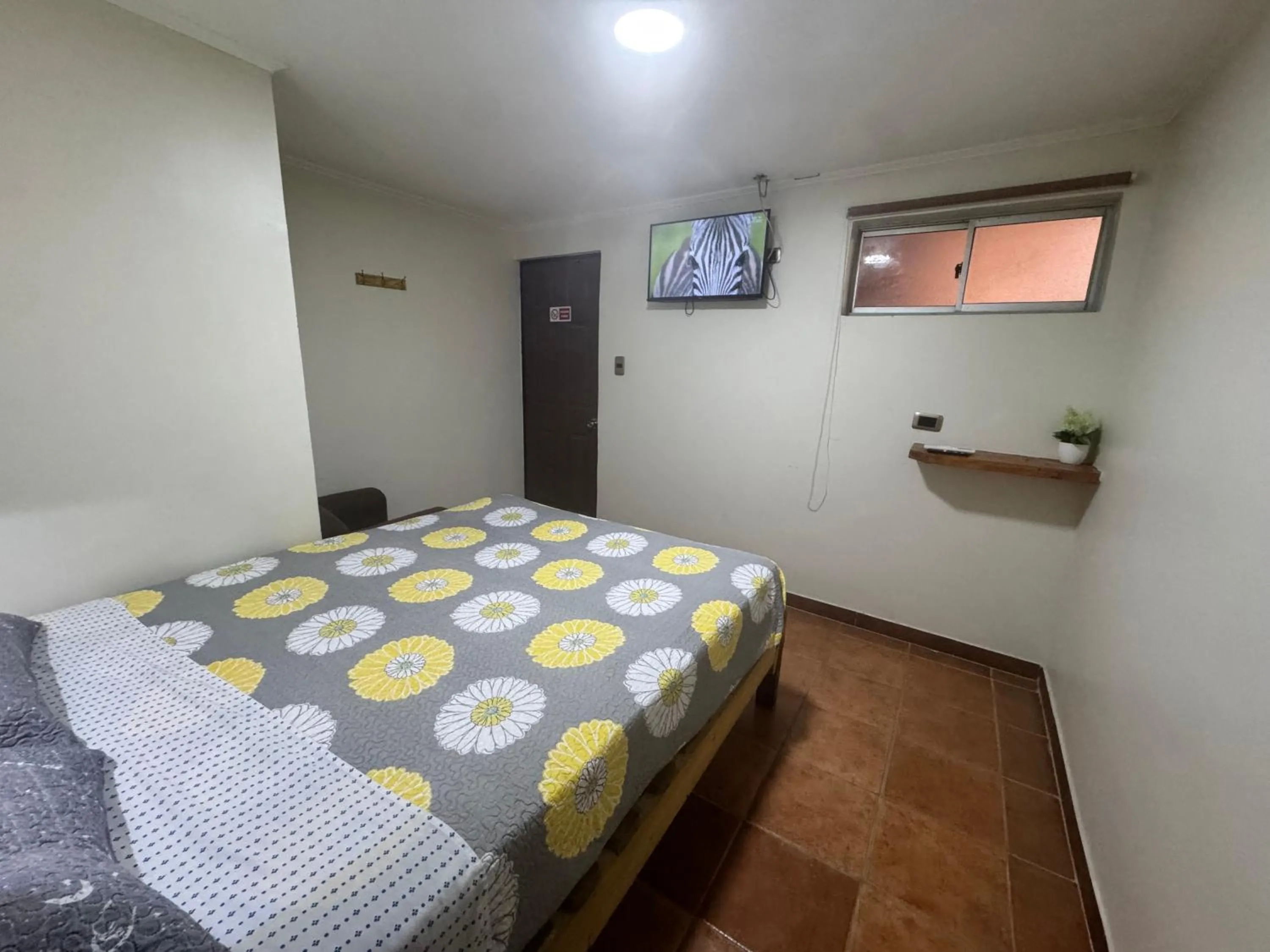 TV and multimedia, Bed in Residencial Don Santiago