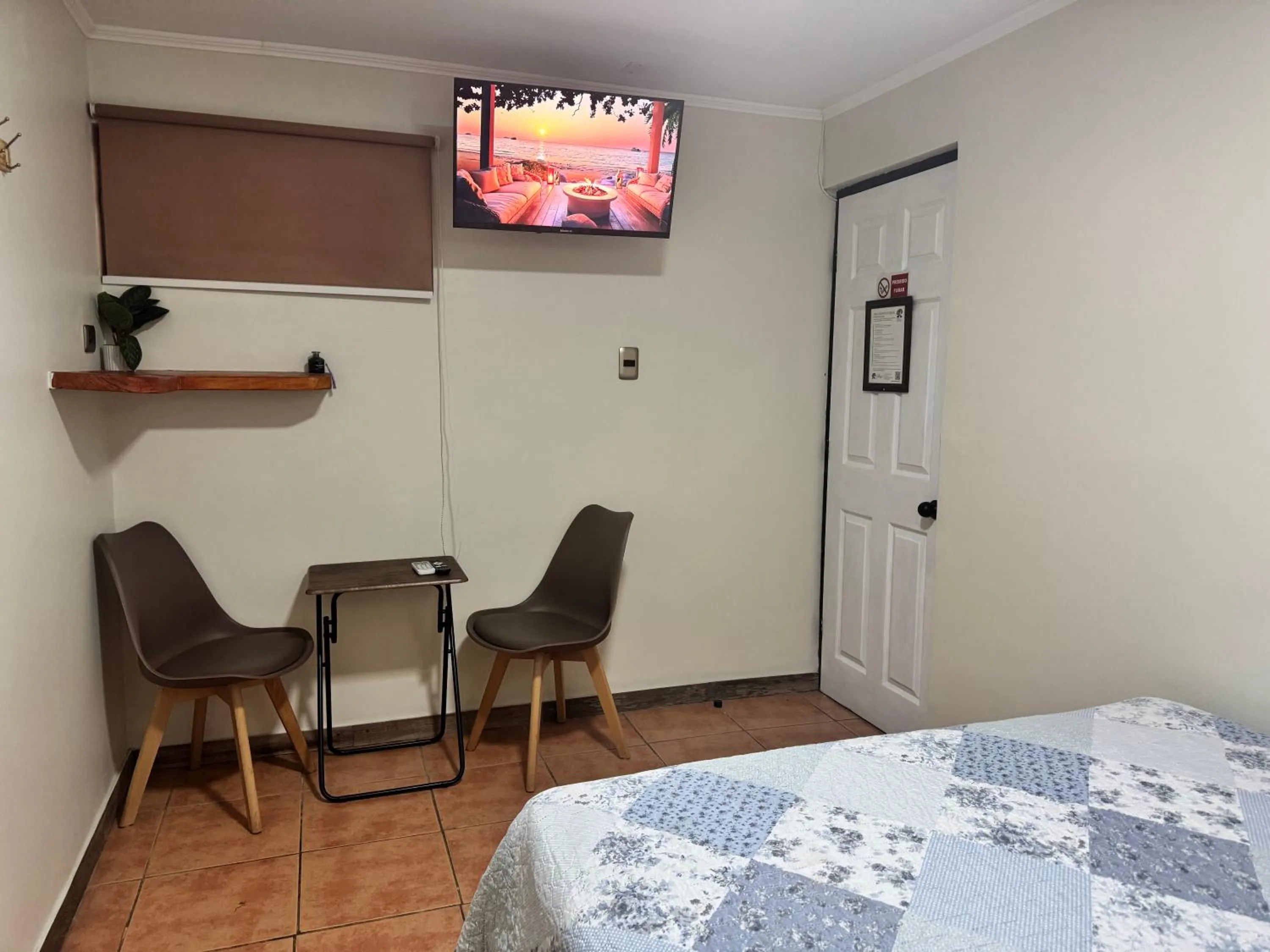 TV and multimedia, Bed in Residencial Don Santiago
