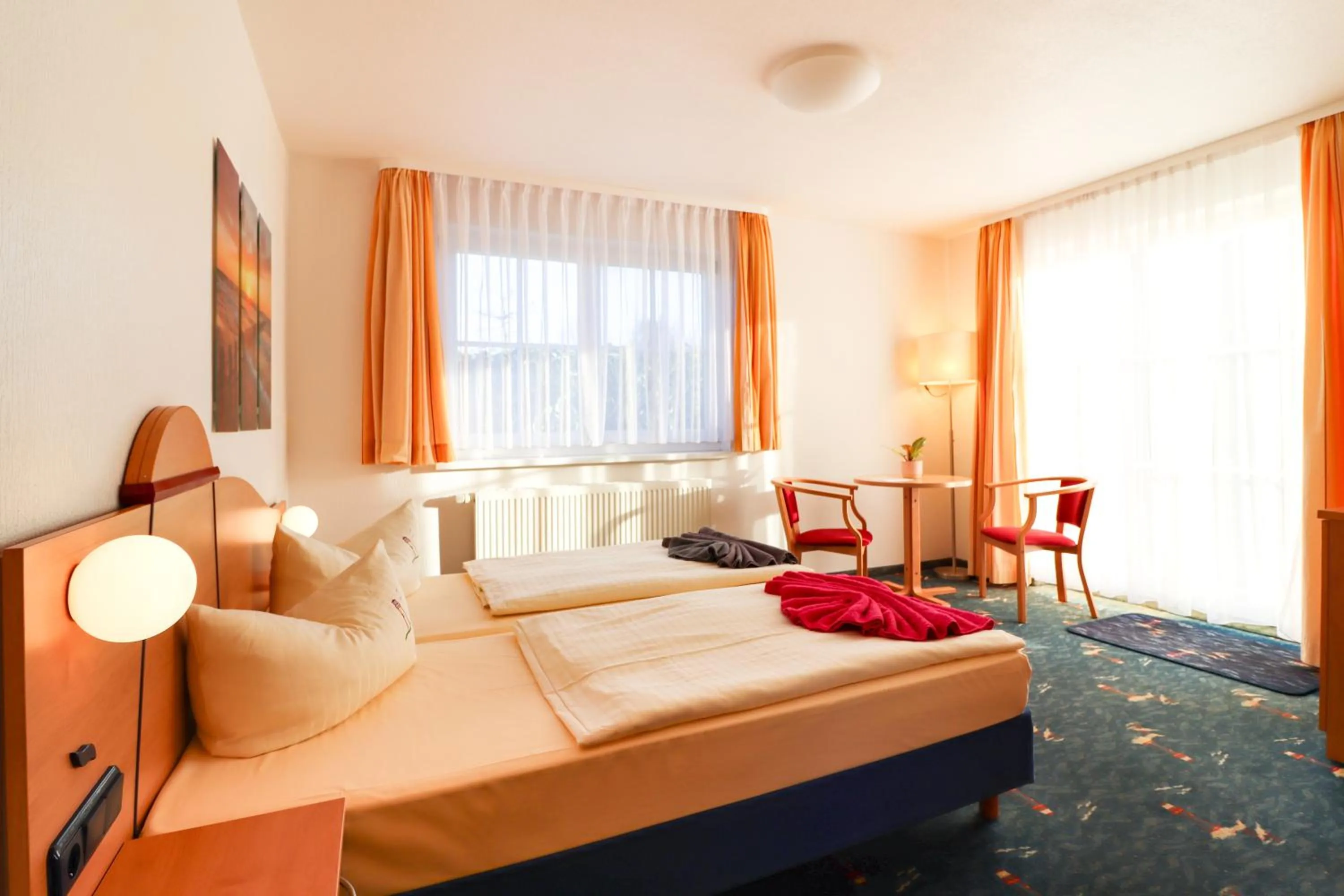 Bed in Aparthotel Leuchtfeuer Rügen