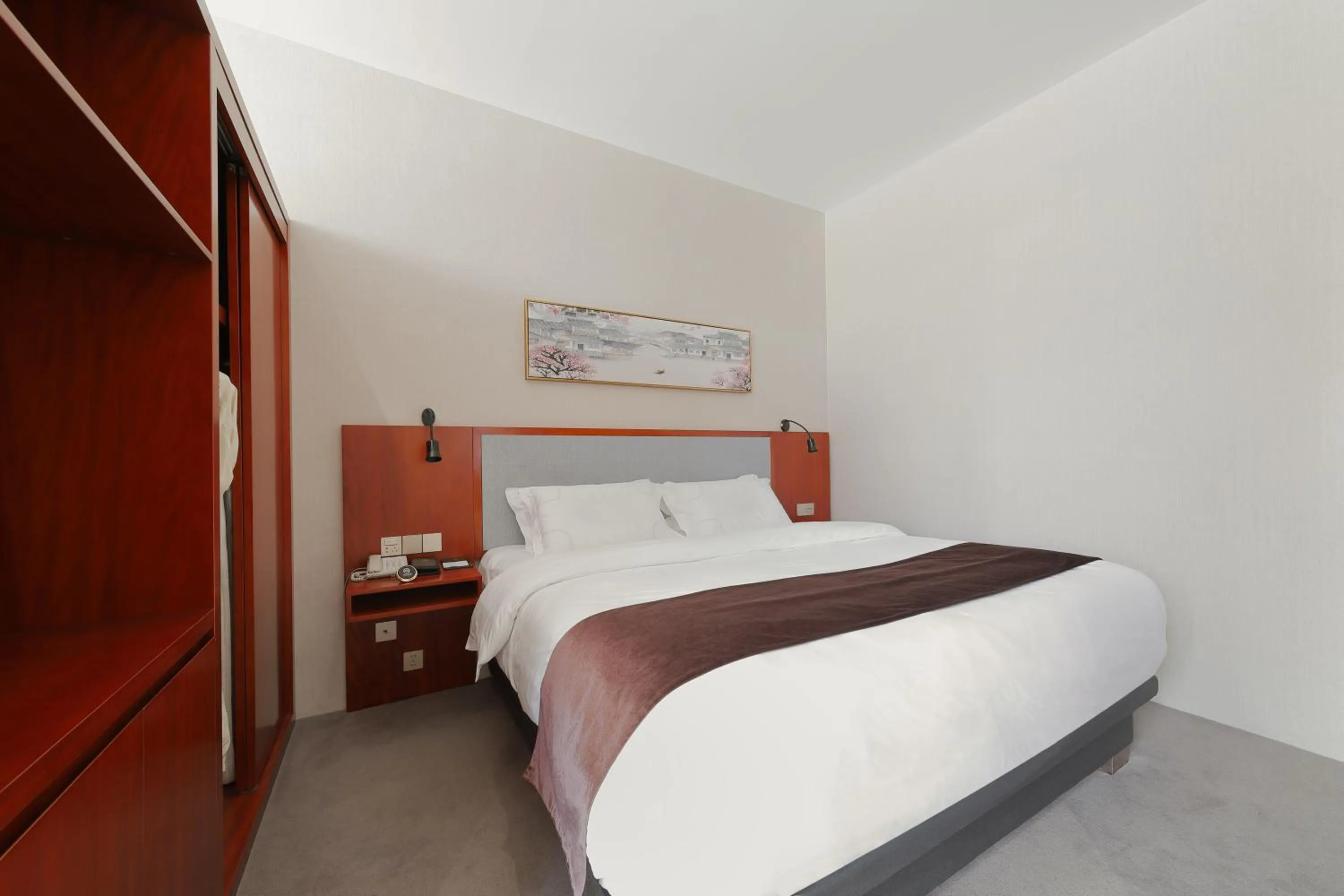 Bed in Mengguo Hotel Pudong Airport