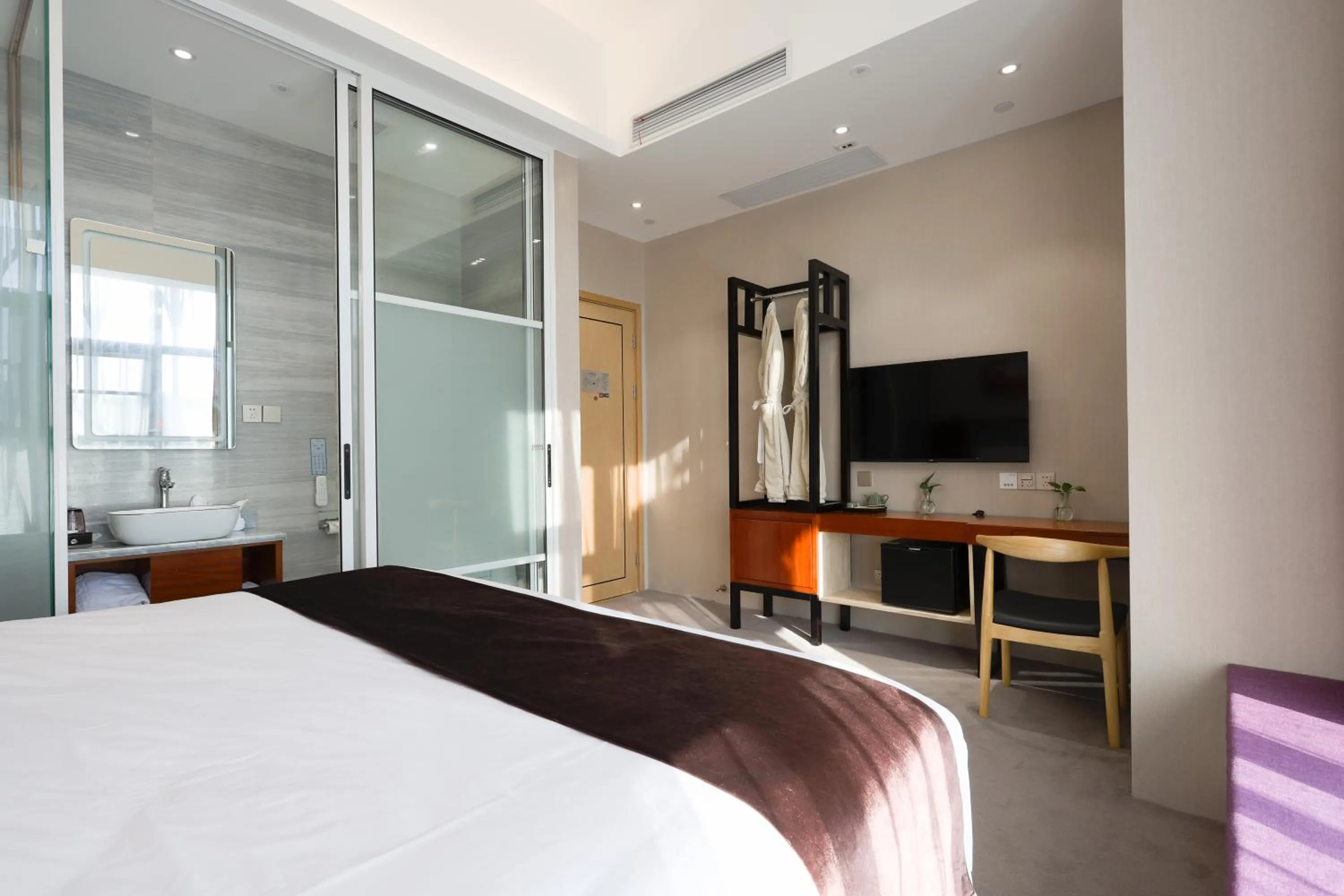 Bed in Mengguo Hotel Pudong Airport