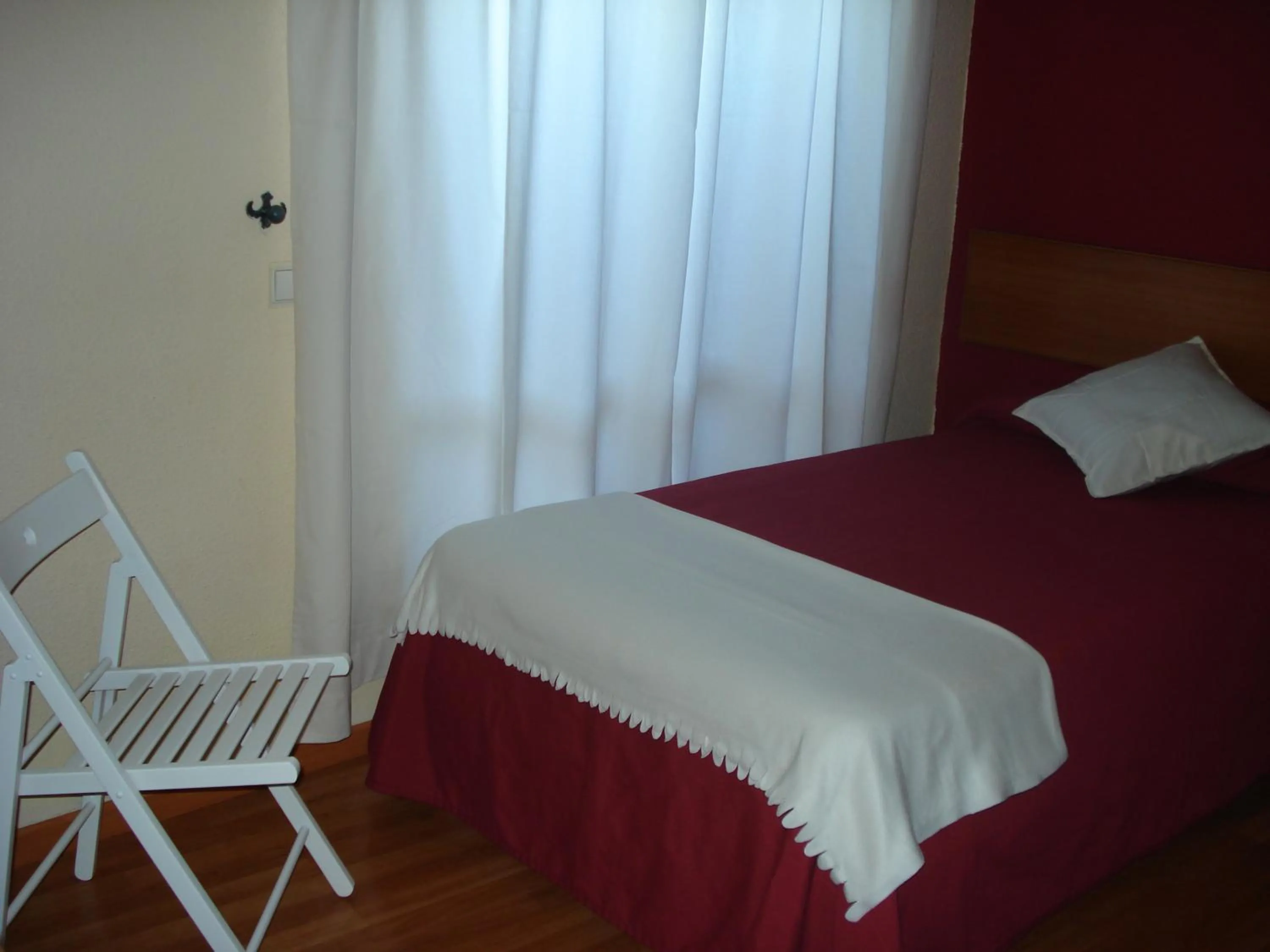 Decorative detail, Bed in Guesthouse RSA by Umbral