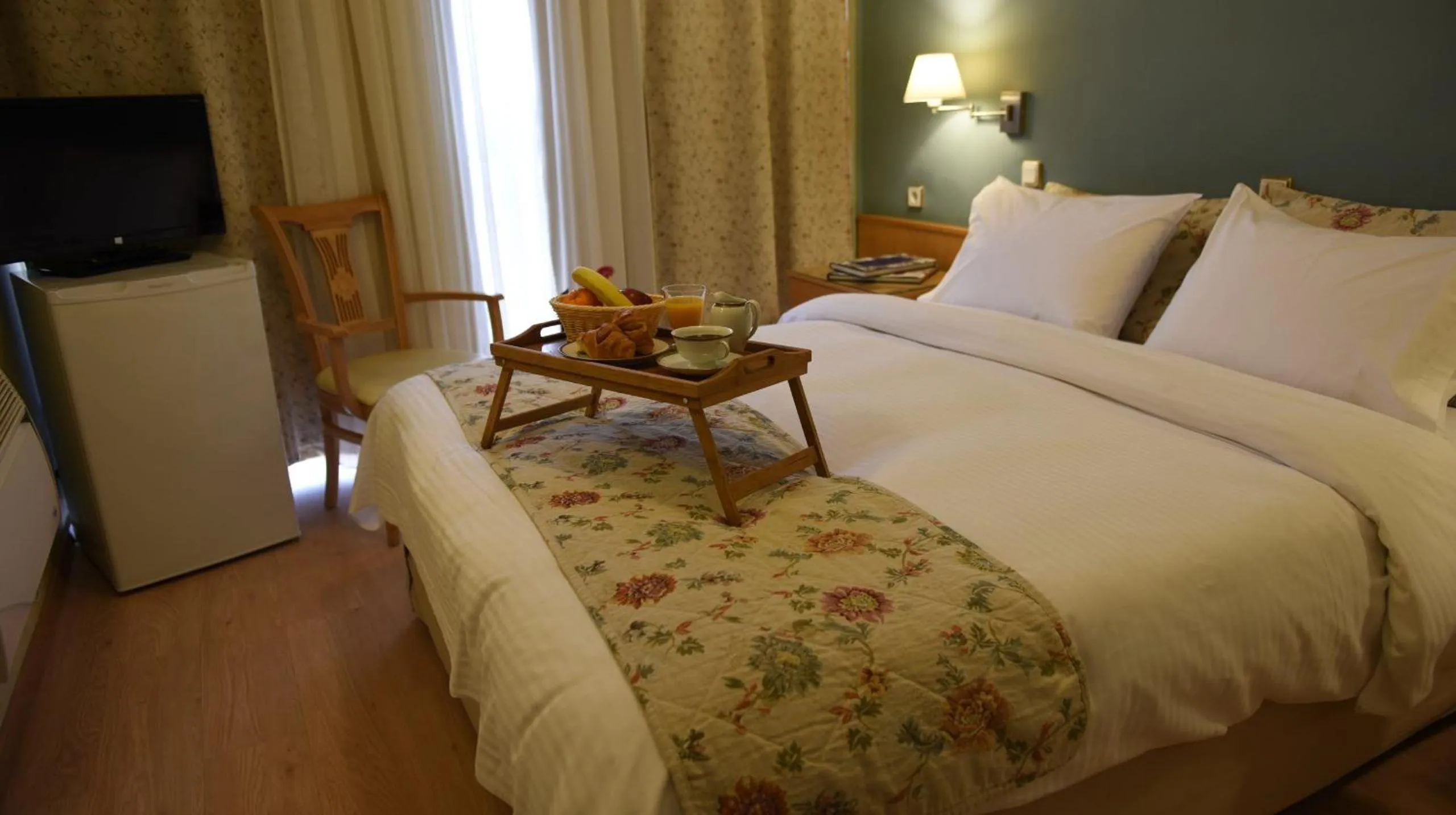 Bed in Hotel Xanthippion