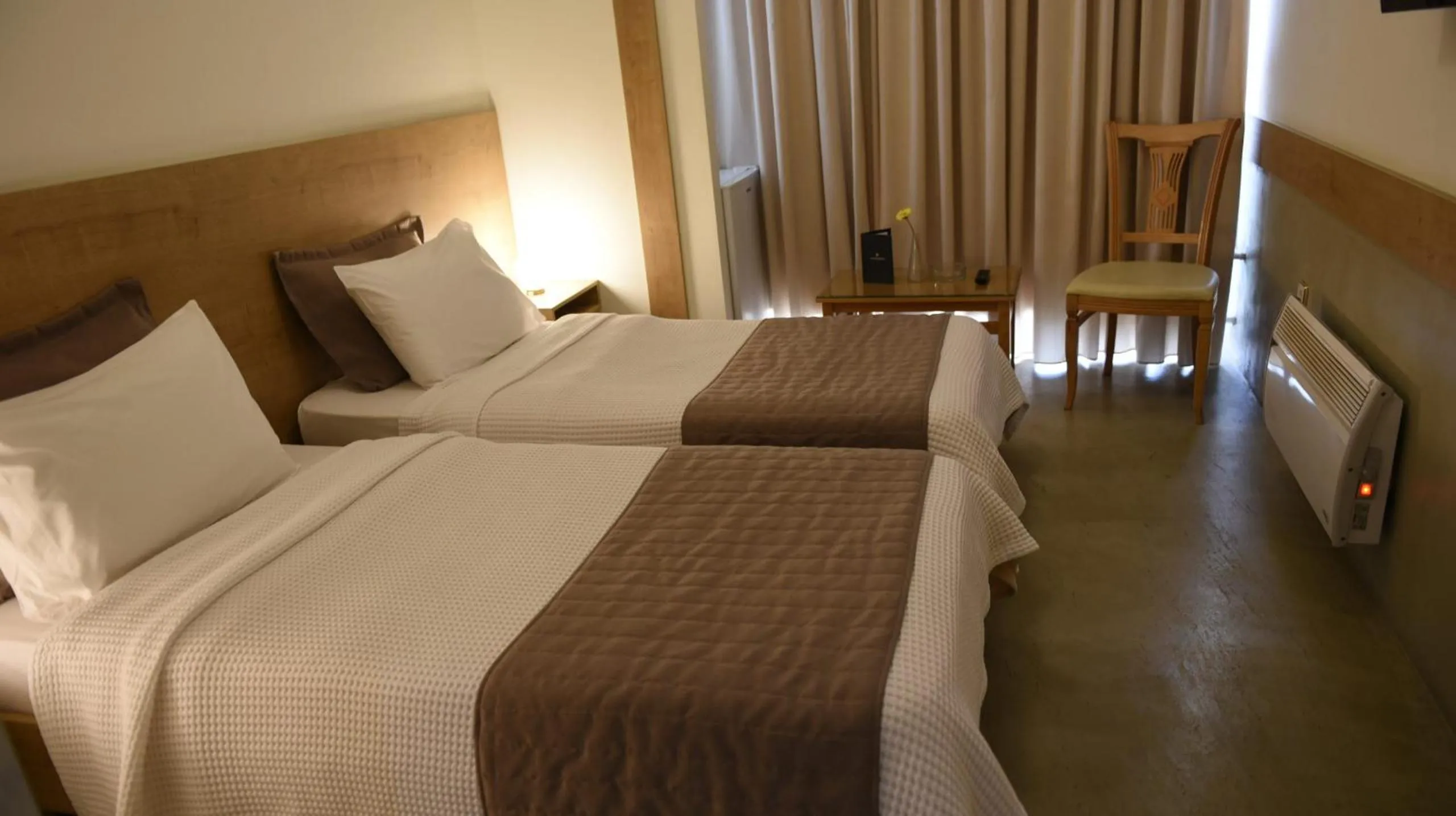 Bed in Hotel Xanthippion