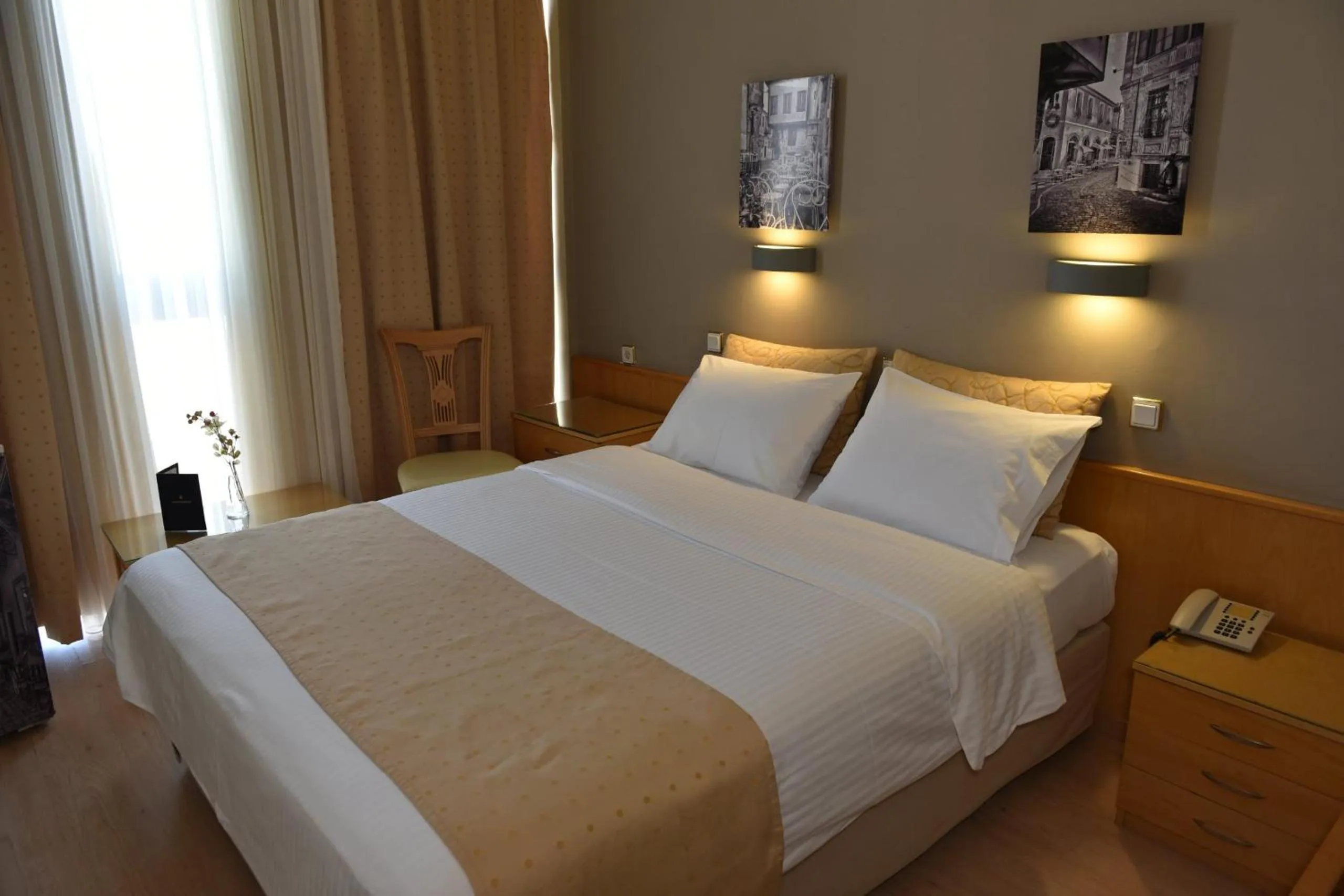 Bed in Hotel Xanthippion