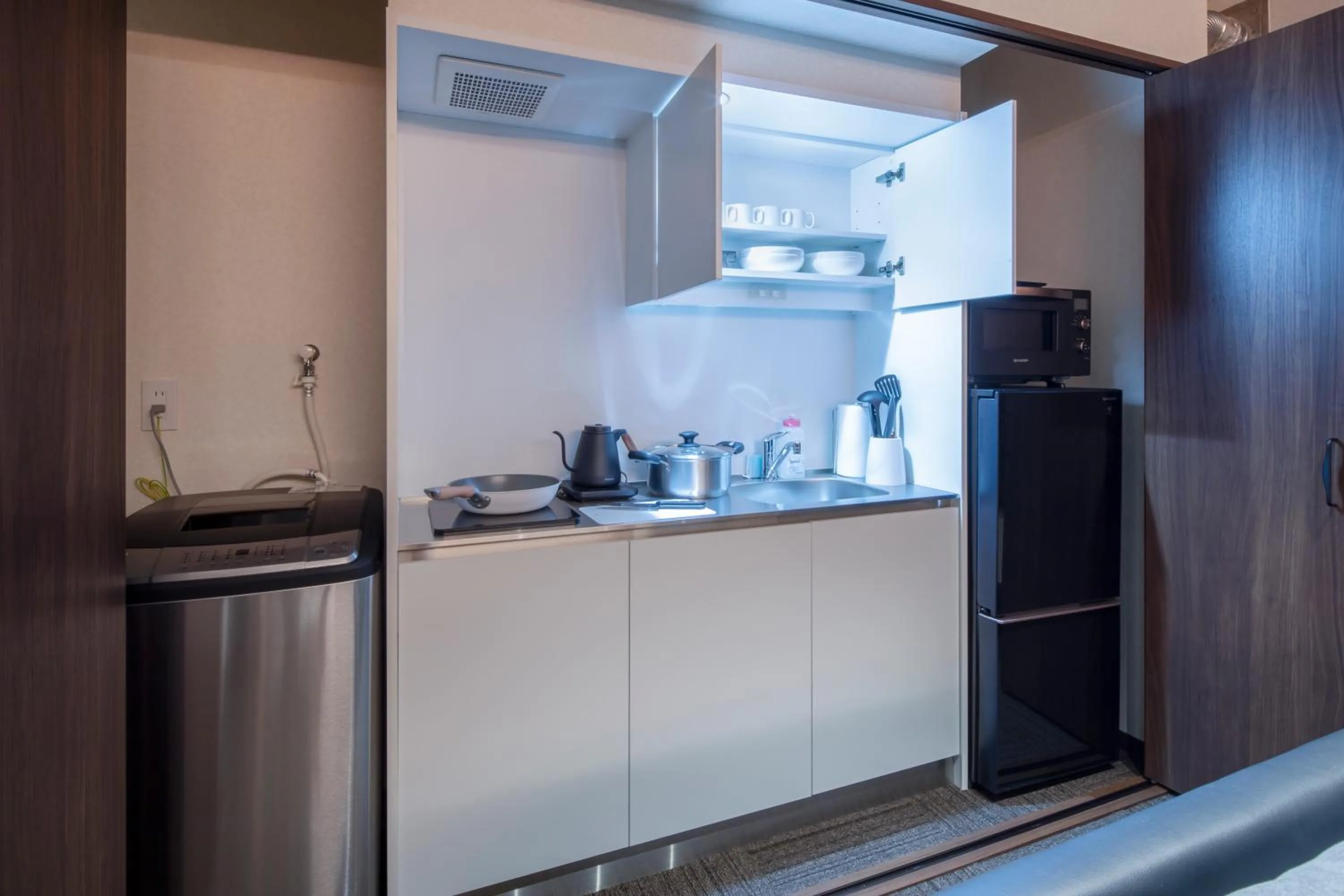 Kitchen or kitchenette in Randor Residence Hiroshima Suites
