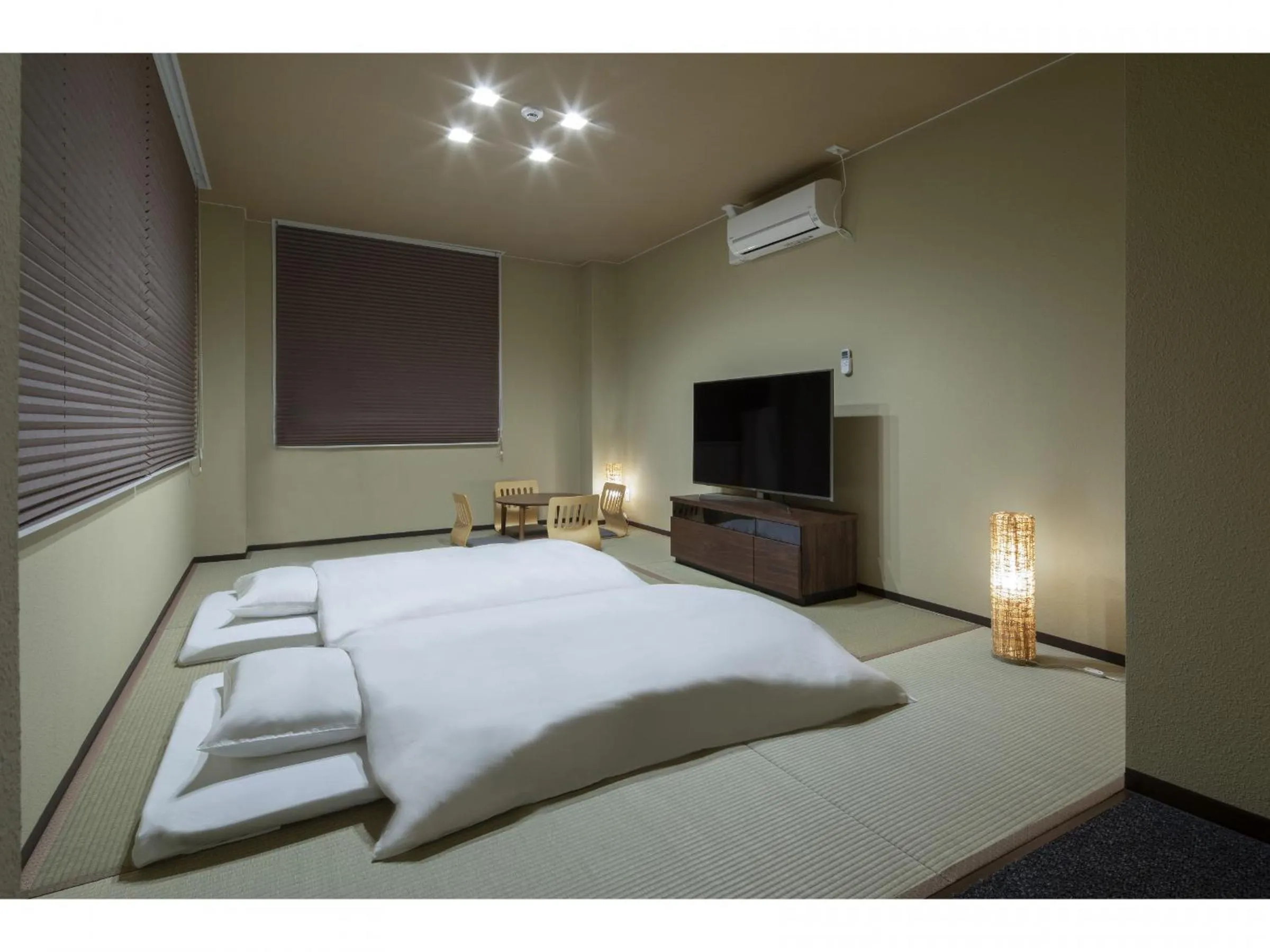 Bed in Randor Residence Hiroshima Suites