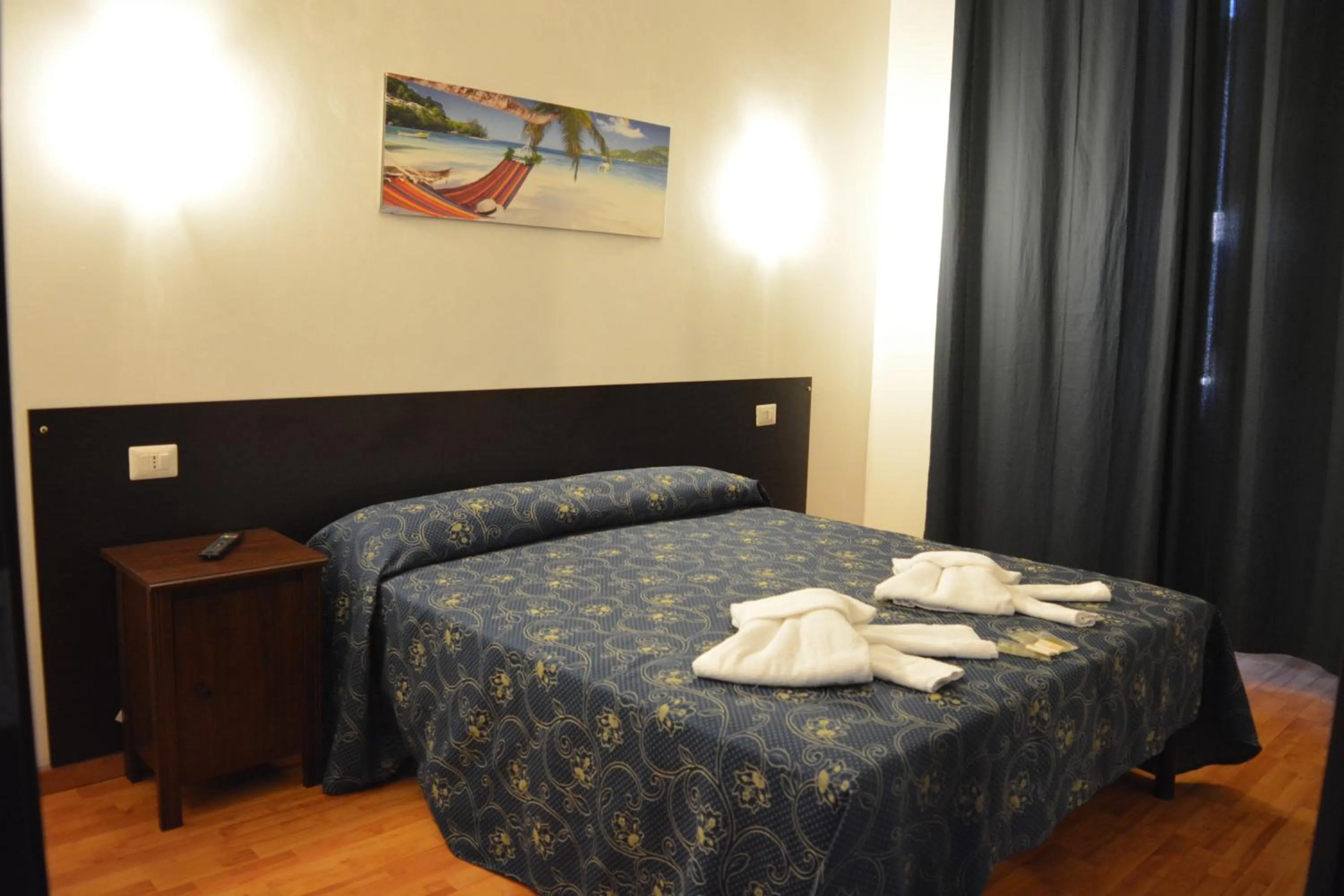 Photo of the whole room, Bed in Locanda Otello
