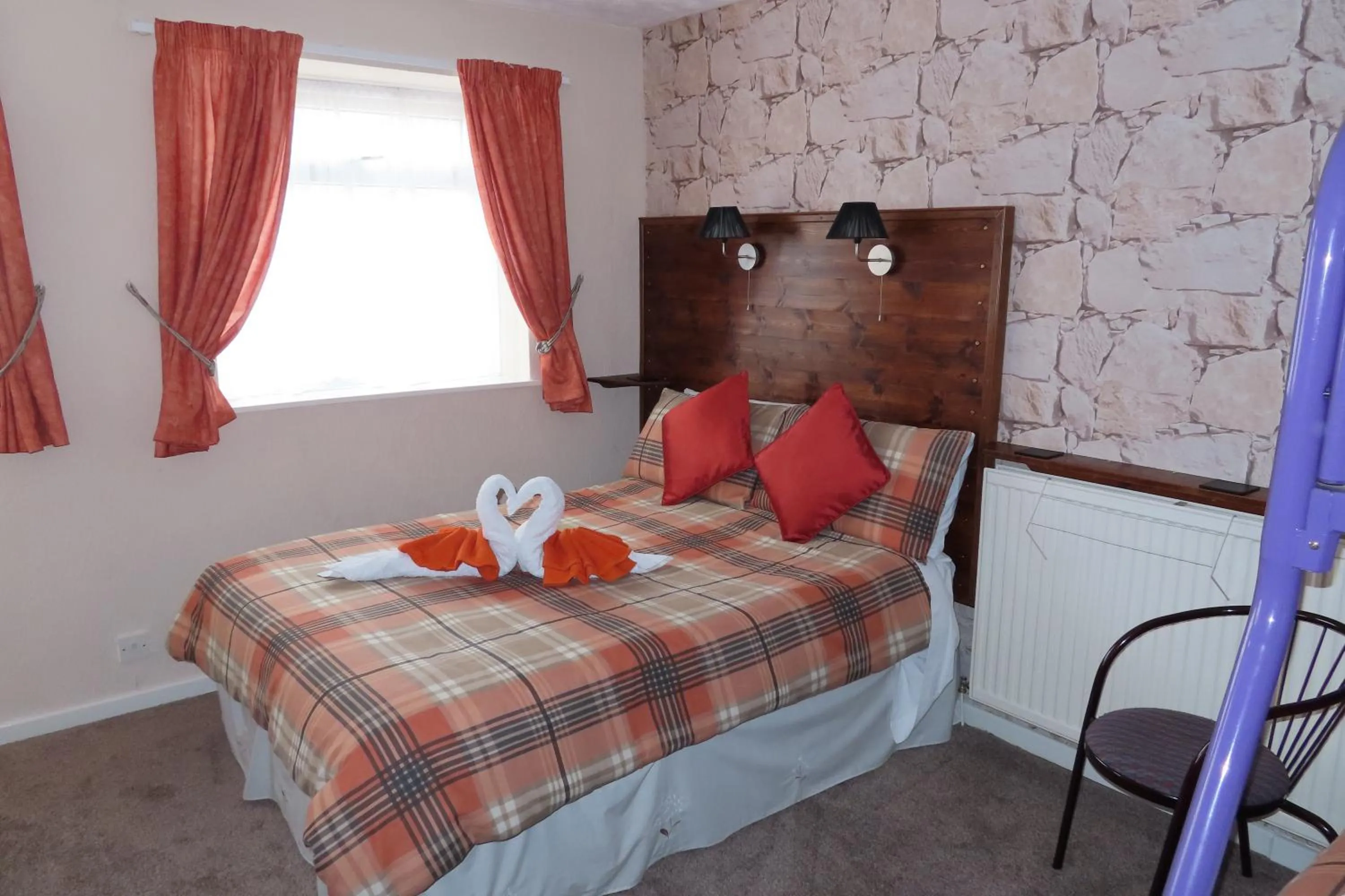 Bed in The Rowan Hotel