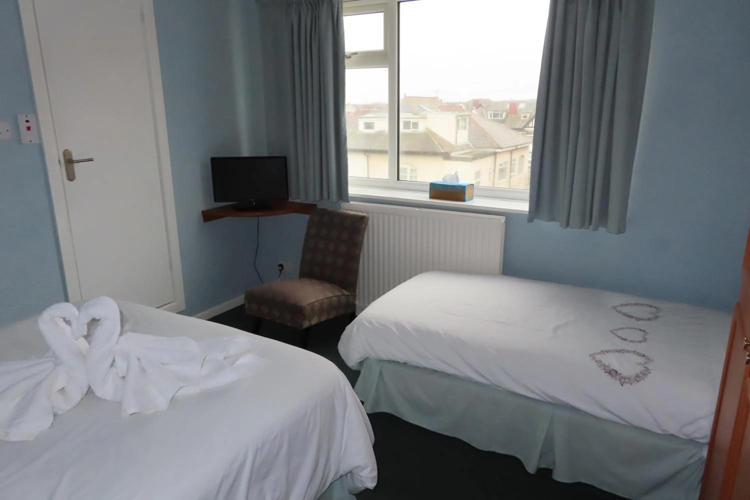 Bed in The Rowan Hotel