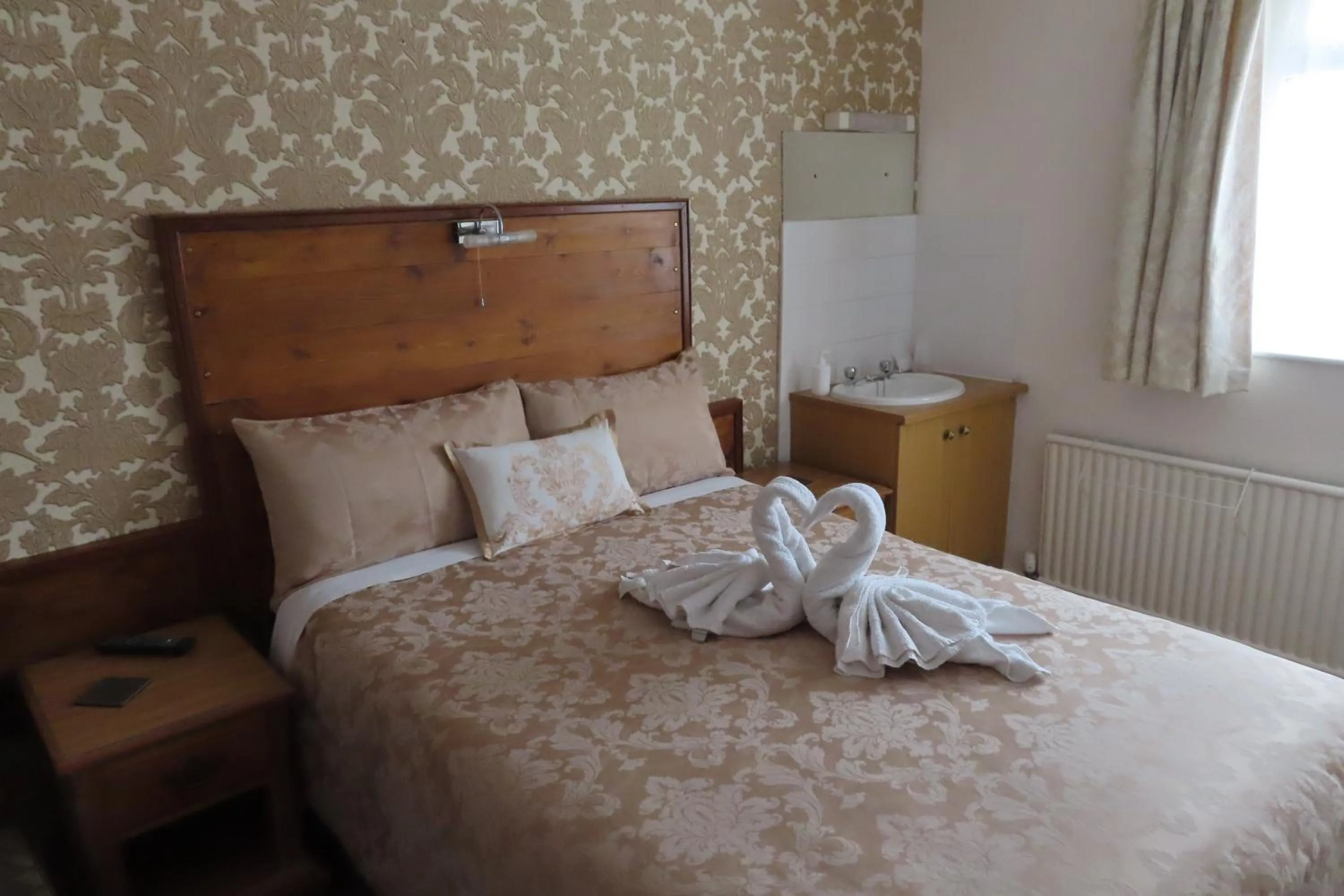 Bed in The Rowan Hotel