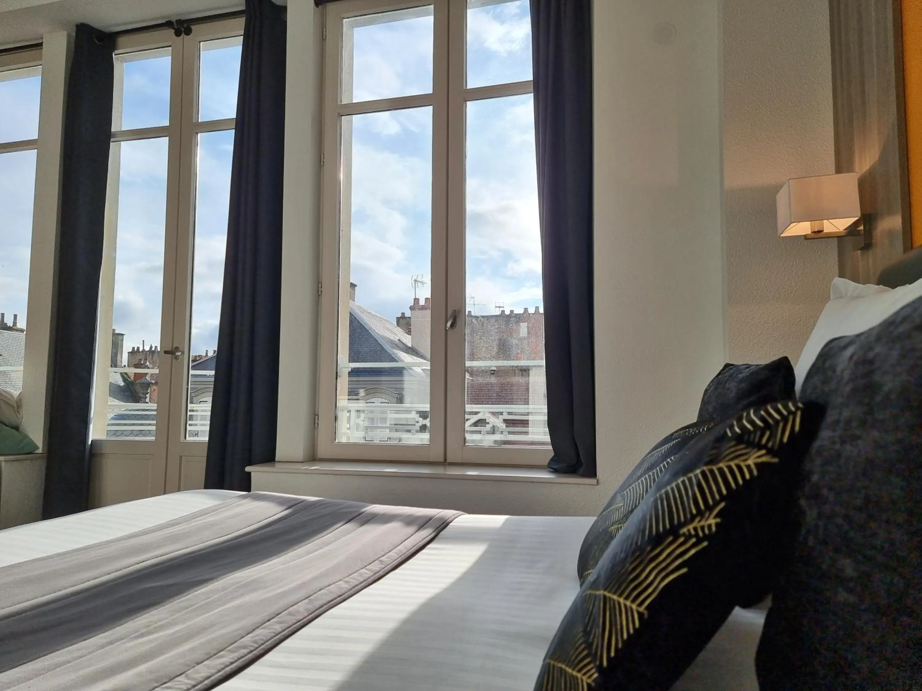 Bed in City Loft Apparthotel