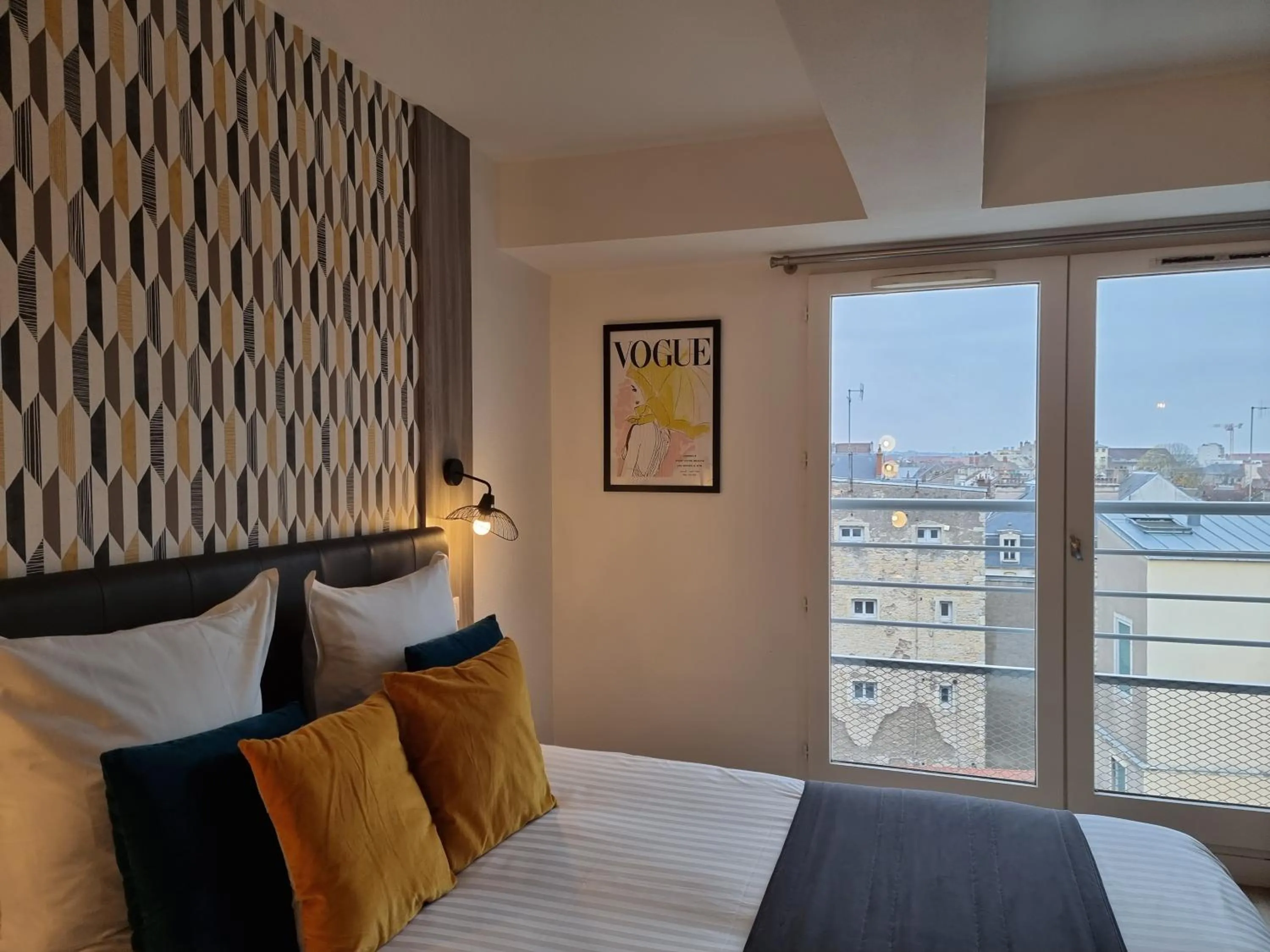 Bed in City Loft Apparthotel