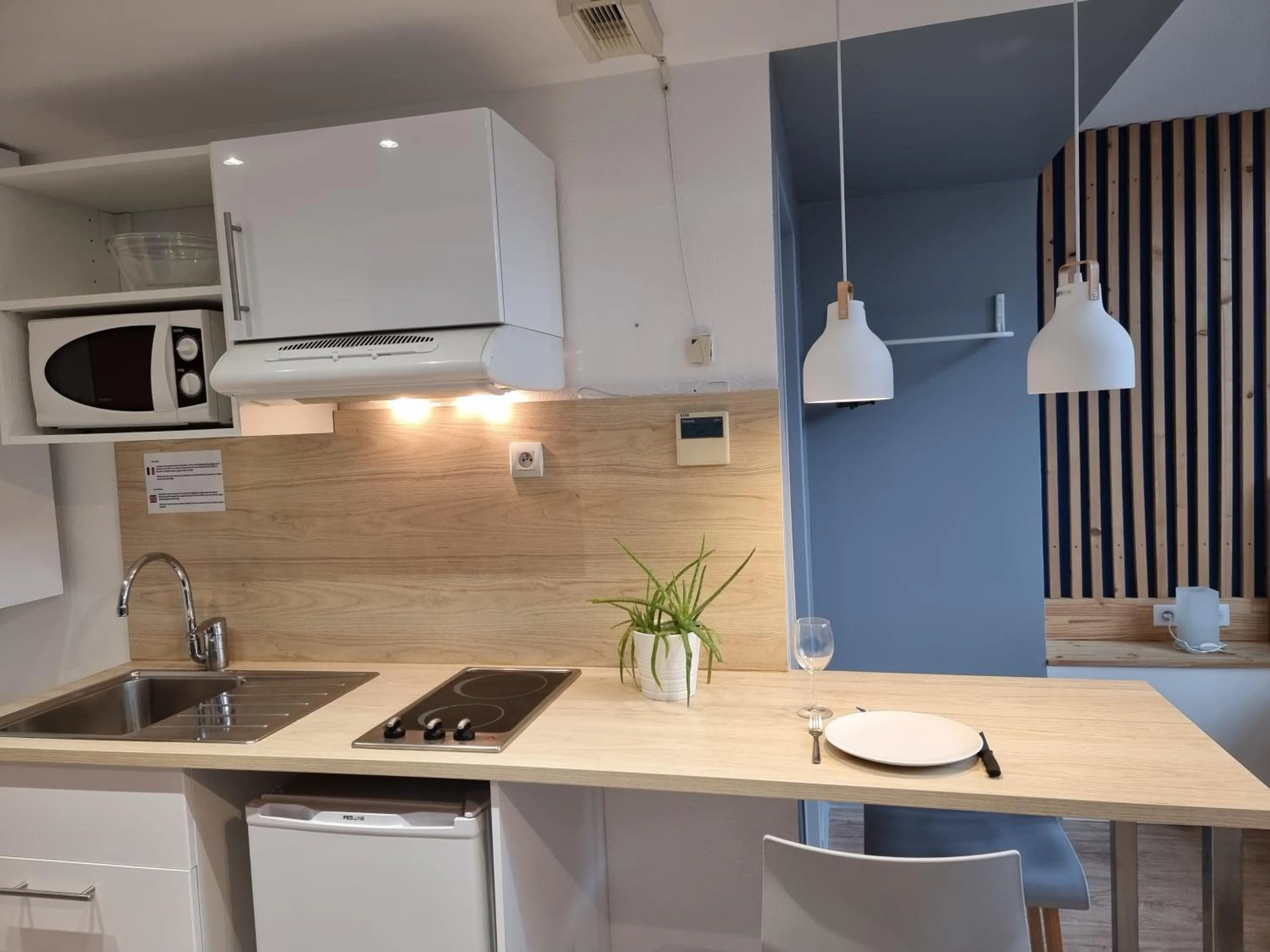Kitchen or kitchenette in City Loft Apparthotel