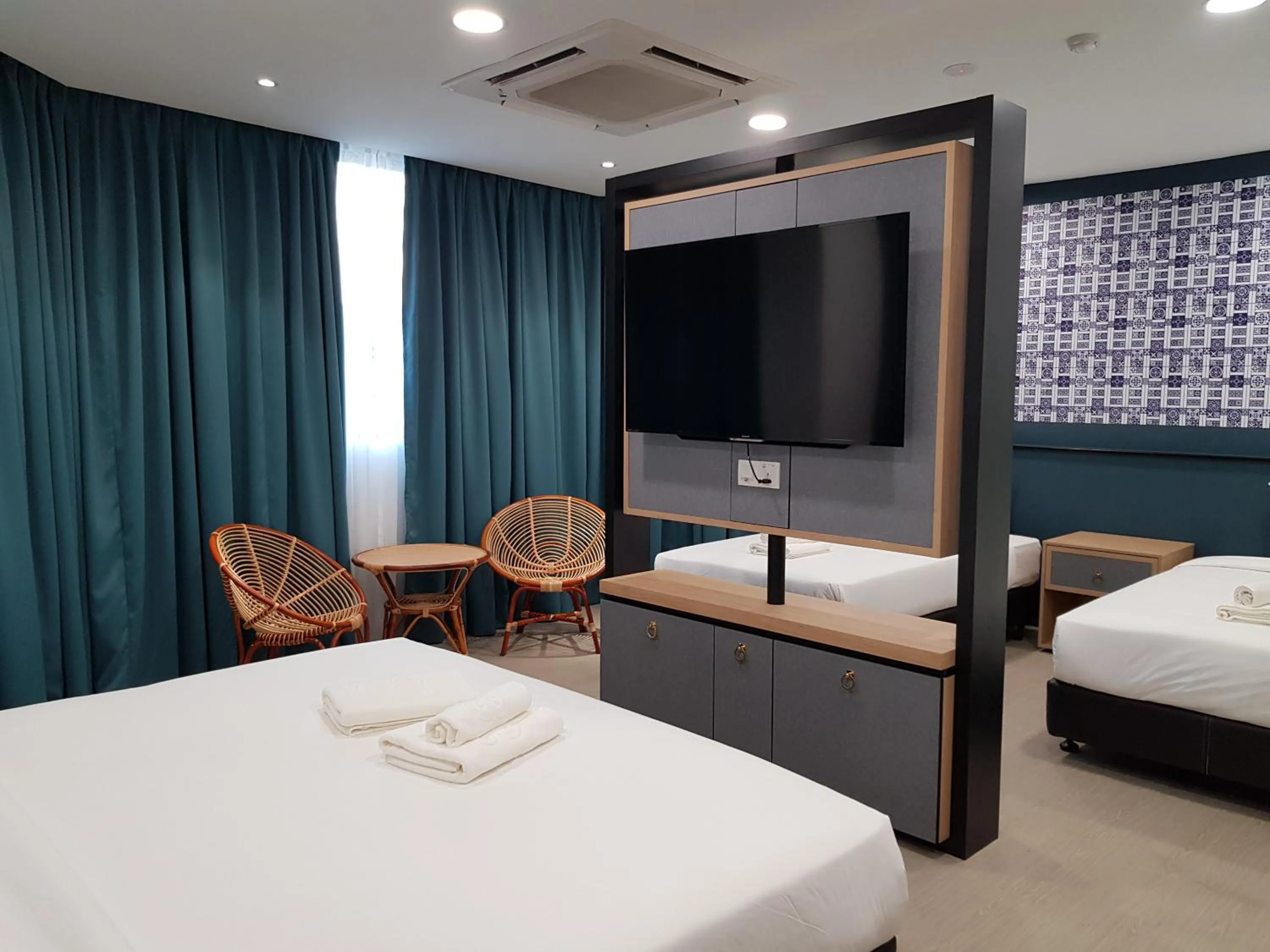 Communal lounge/ TV room, Bed in Bloommaze Boutique Hotel Klang